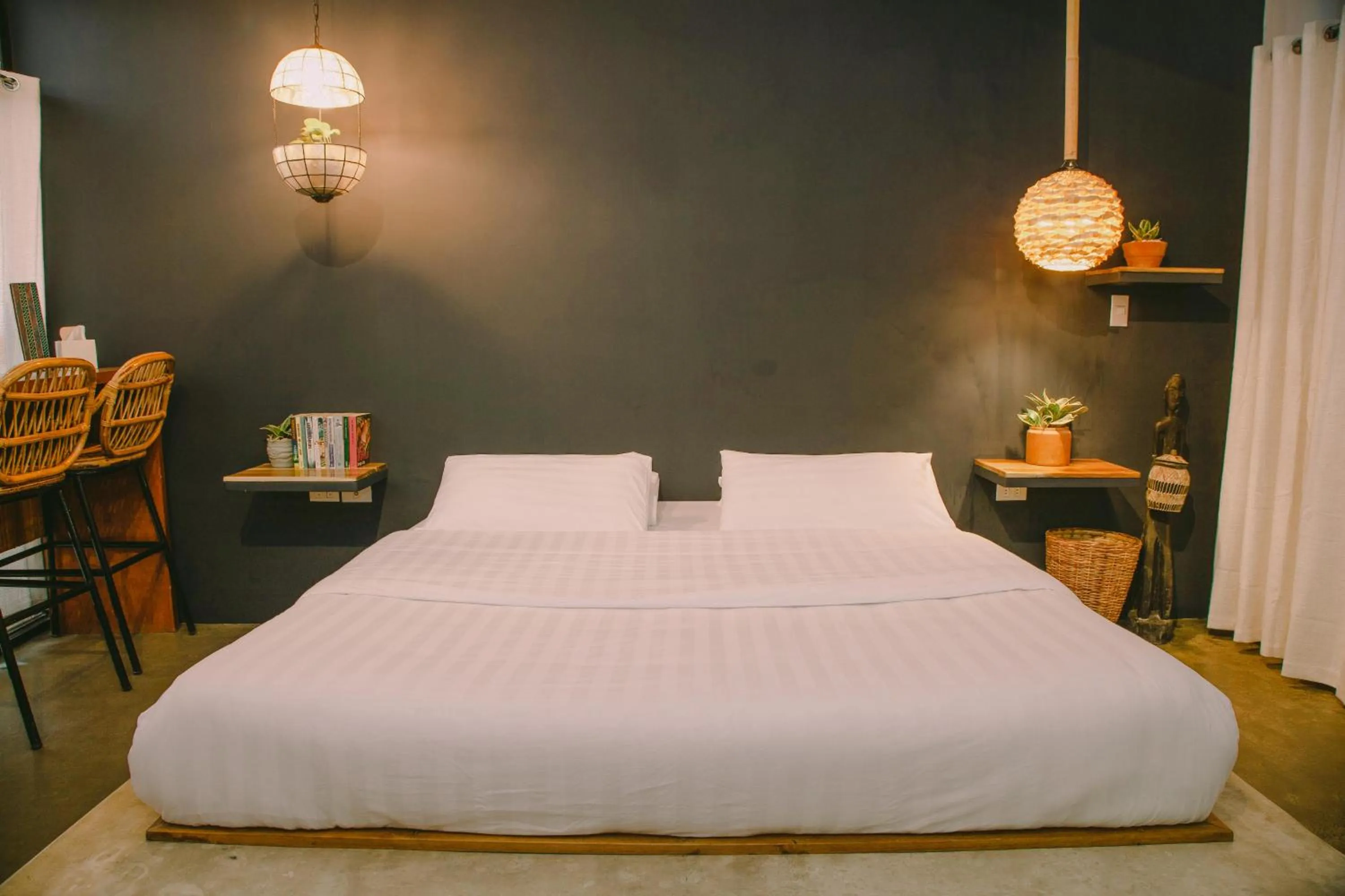 Decorative detail, Bed in SANSE Boutique Hotel