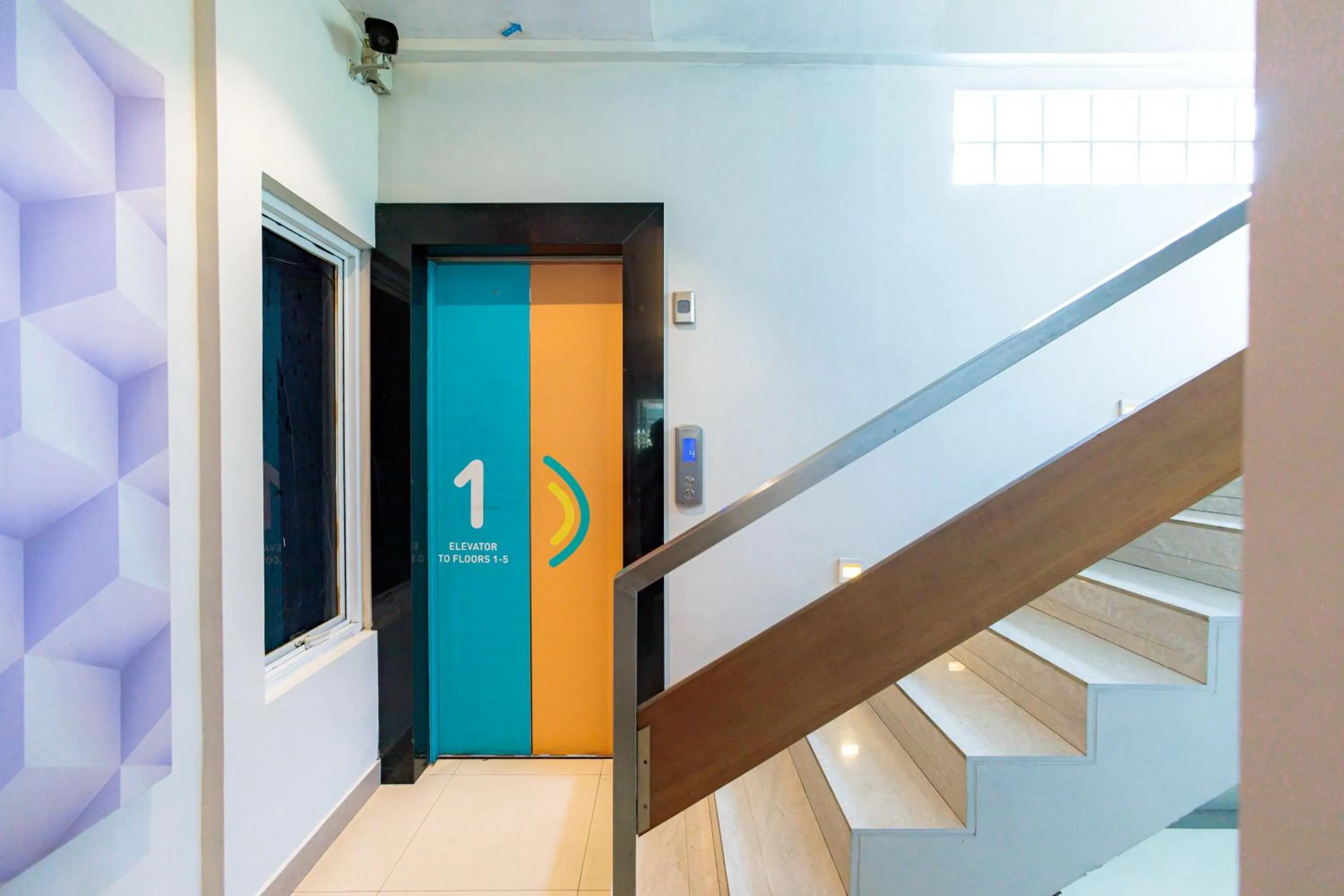 elevator in Sans Hotel Liv Ancol by RedDoorz