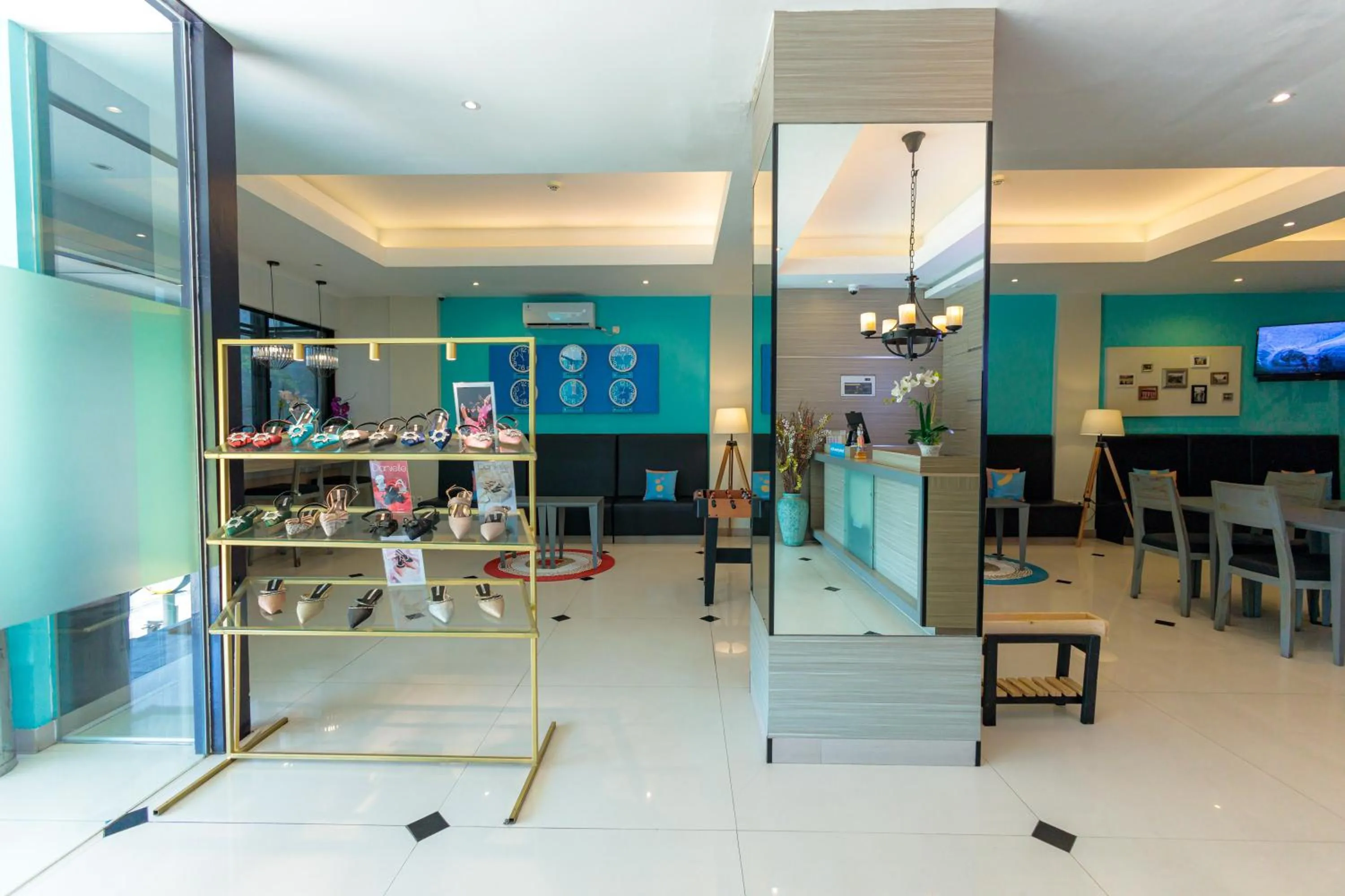 Seating area in Sans Hotel Liv Ancol by RedDoorz