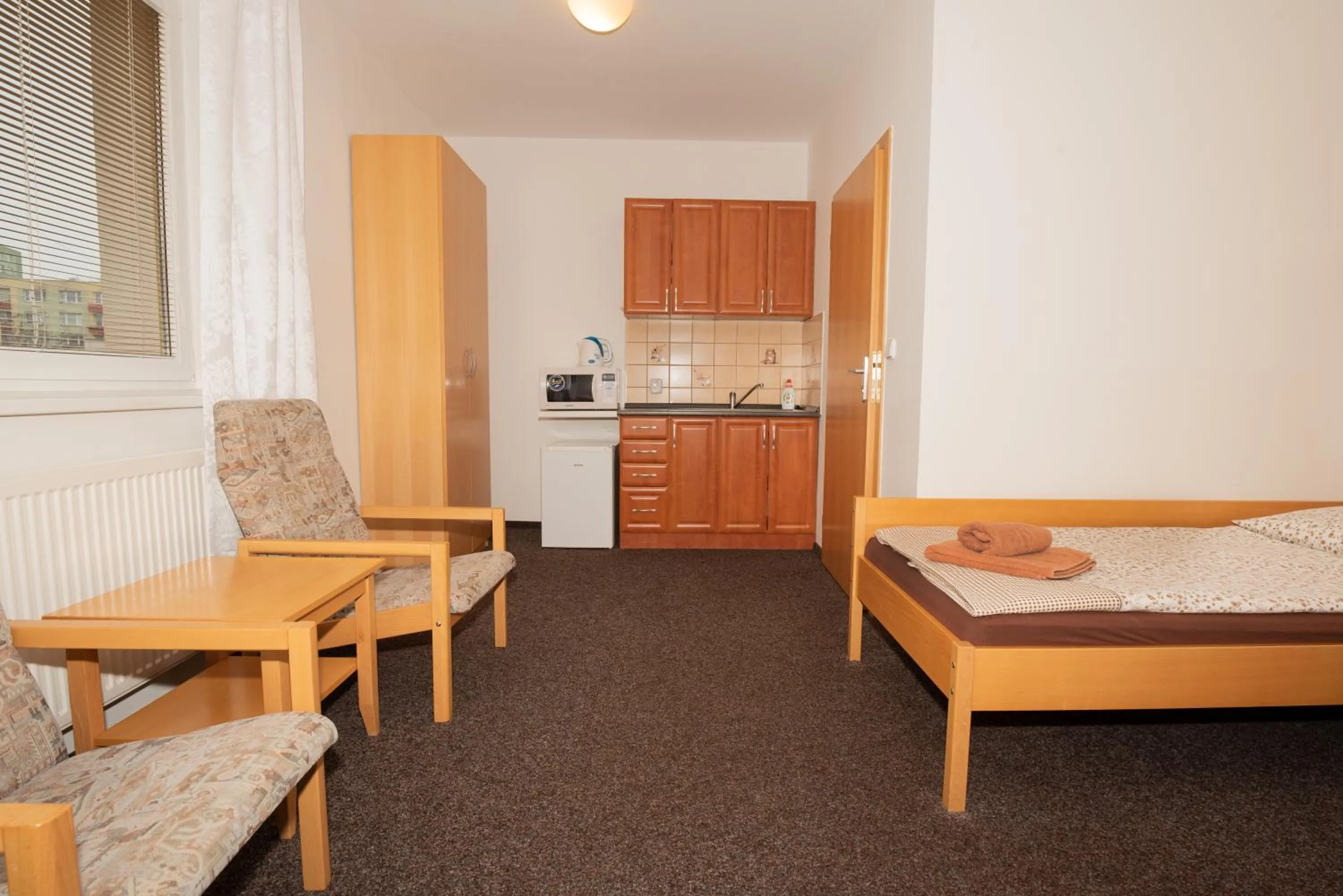 Bed in PENZION MAXIM