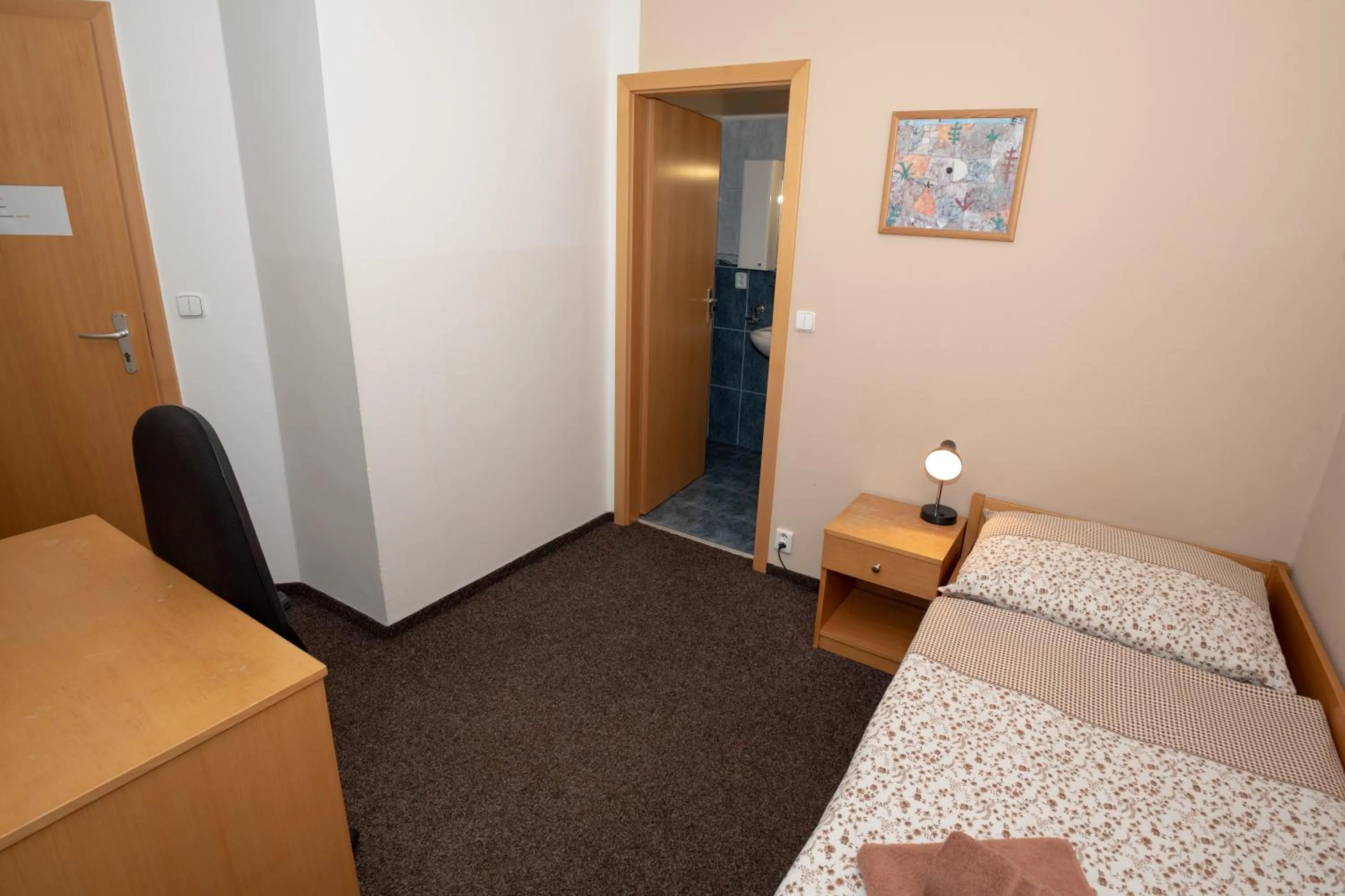 Bed in PENZION MAXIM