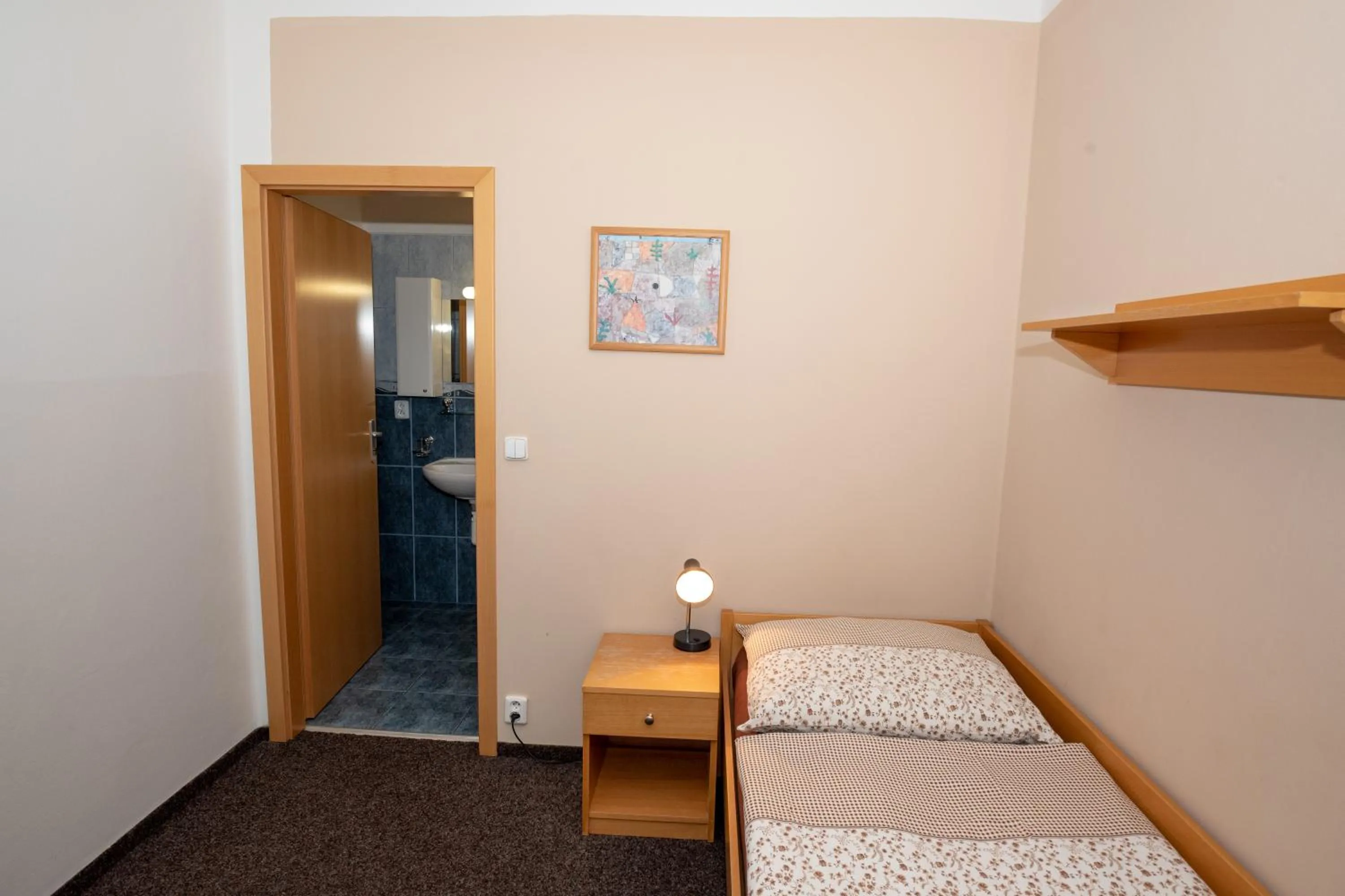 Bed in PENZION MAXIM