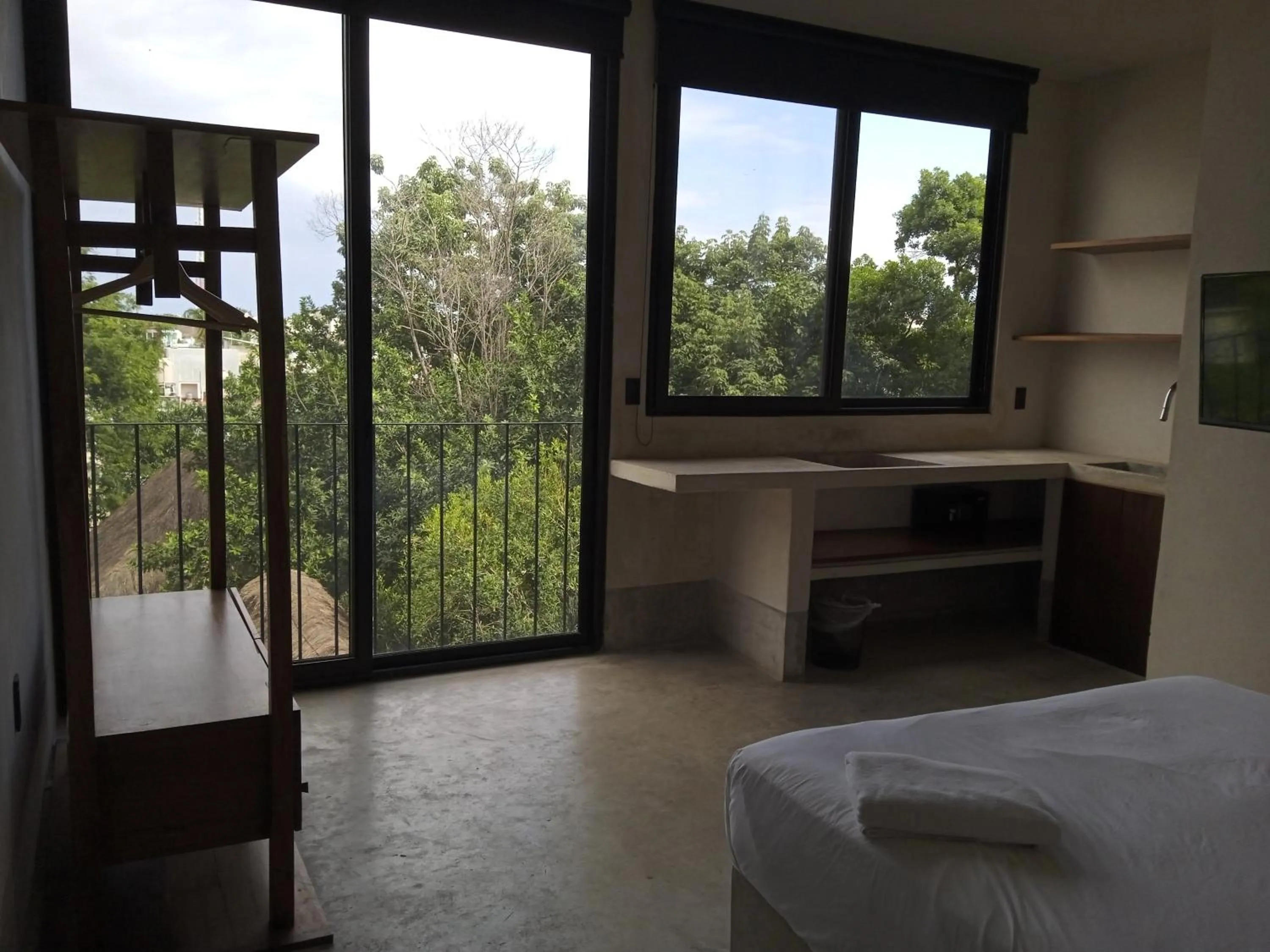 Bed in Nuee Hotel & Beach Club