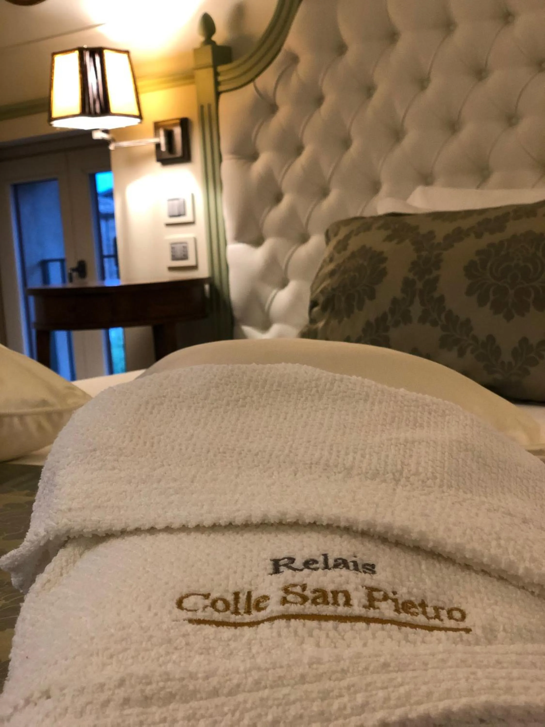 towels, Bed in Relais Colle San Pietro