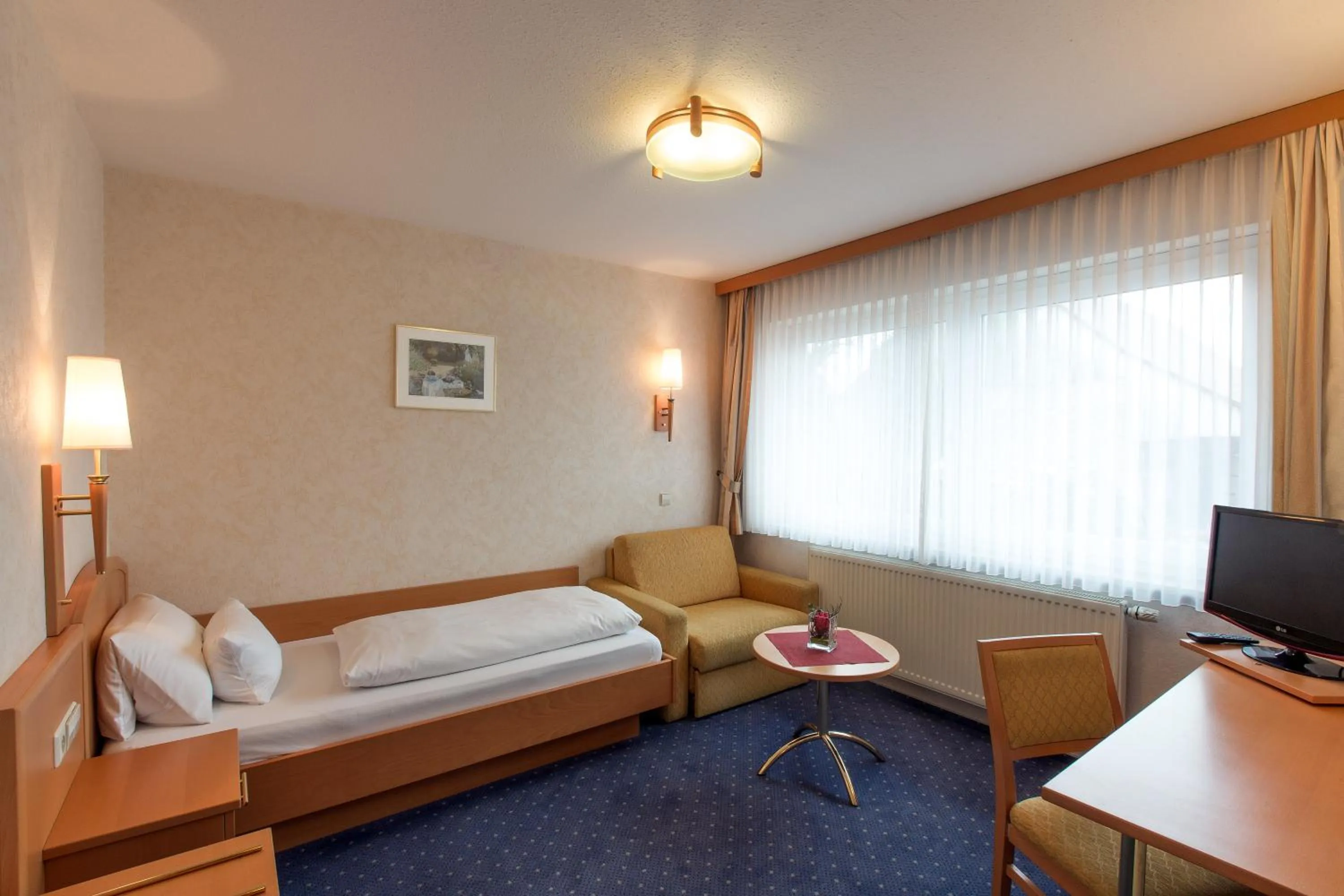 Bed in Hotel Hellers Twenty Four II -24h-Check-In-