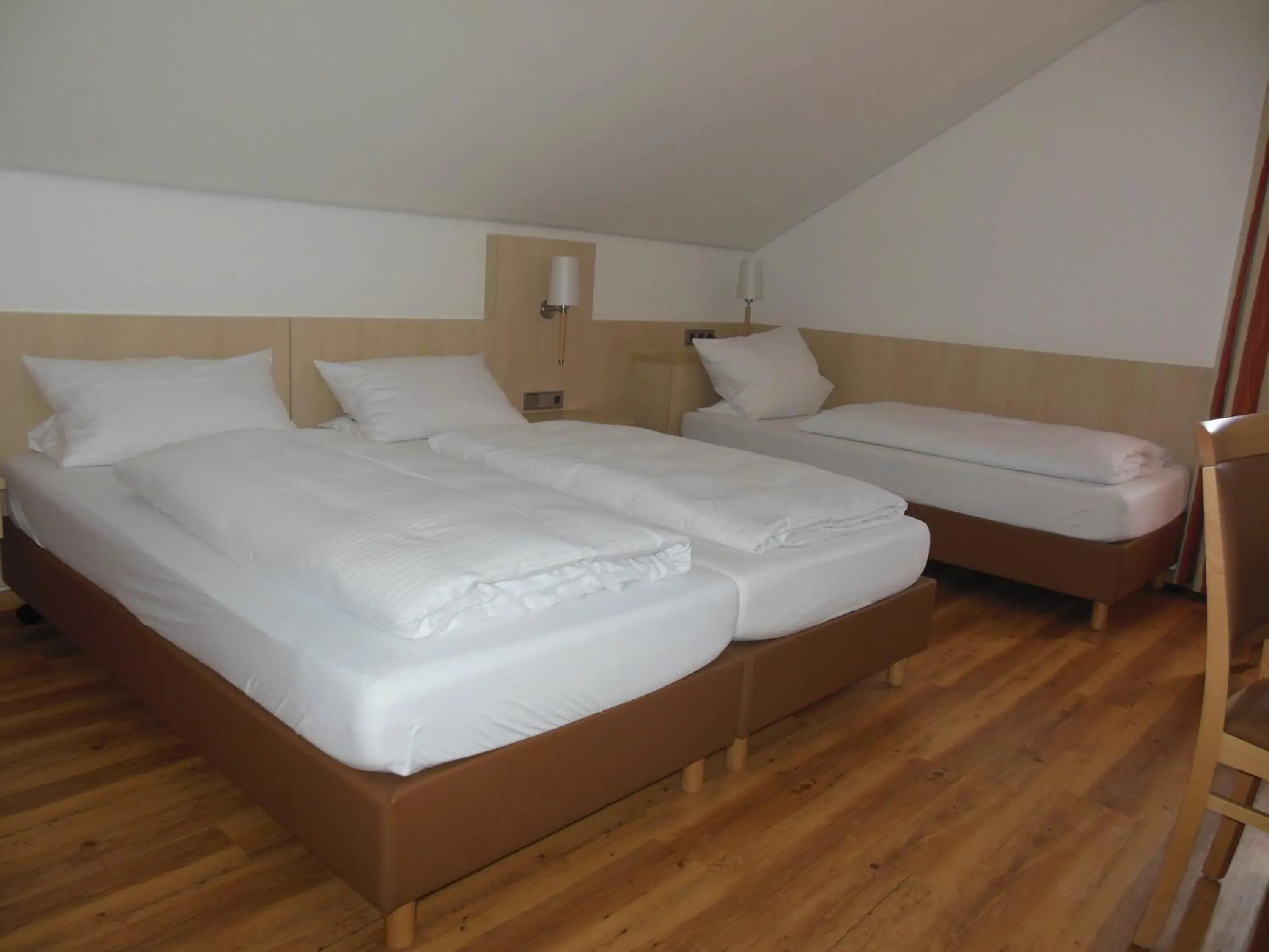 Triple Room in Hotel & Restaurant Zum Ochsen -Ox Distillery Triple Room in Hotel & Restaurant Zum Ochsen -Ox Distillery