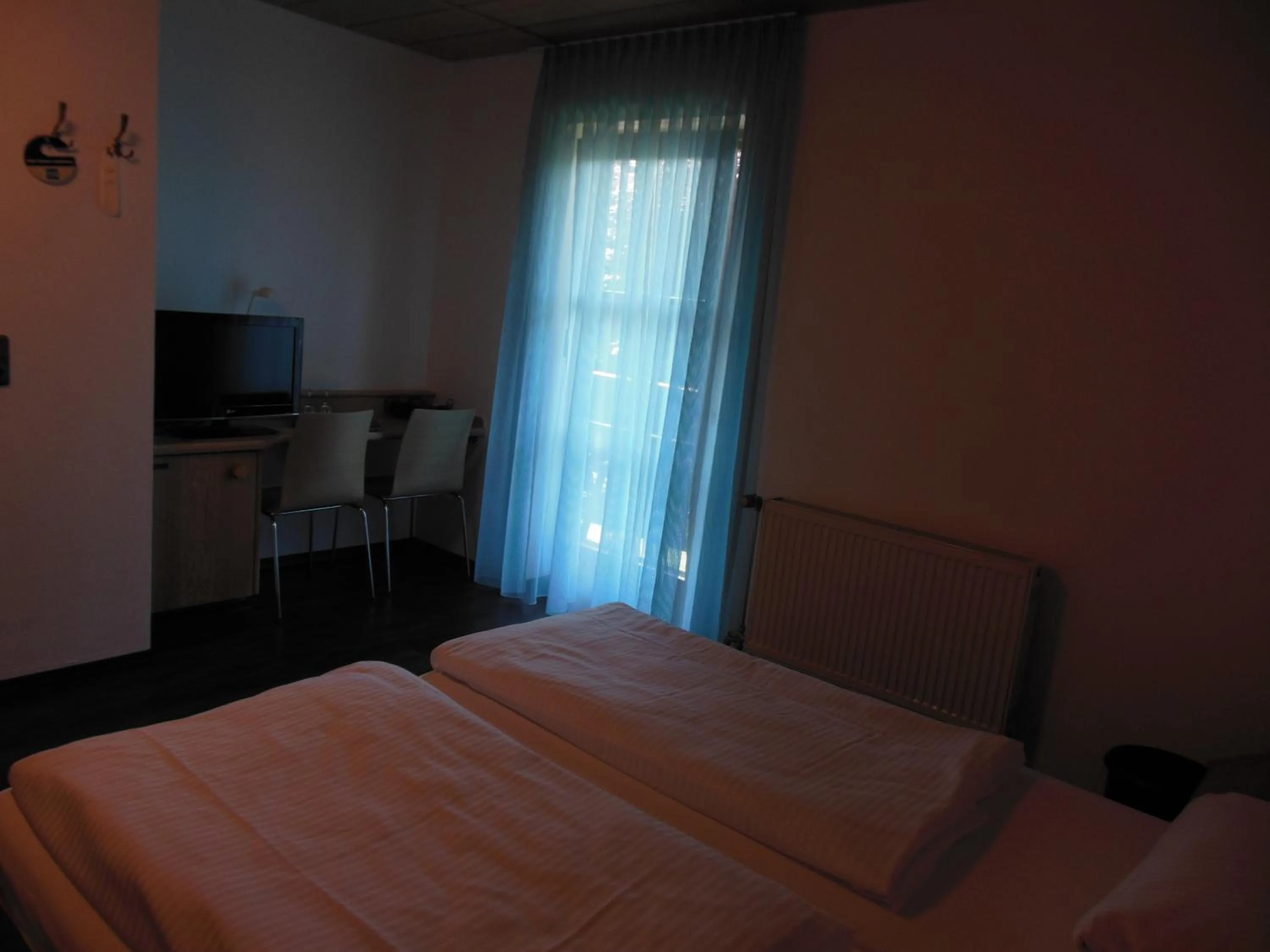 Photo of the whole room, Bed in Hotel & Restaurant Zum Ochsen -Ox Distillery