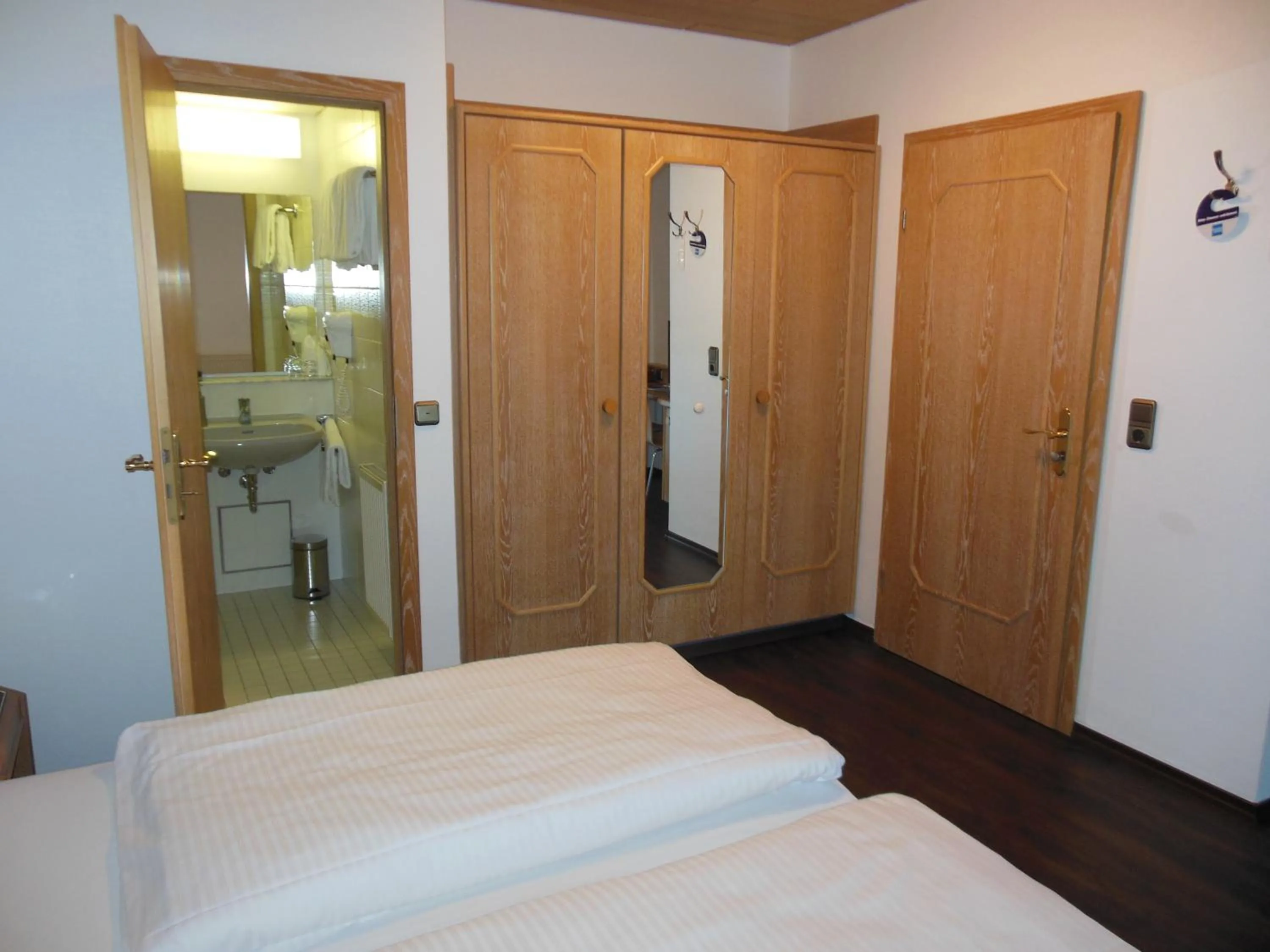 Photo of the whole room, Bed in Hotel & Restaurant Zum Ochsen -Ox Distillery