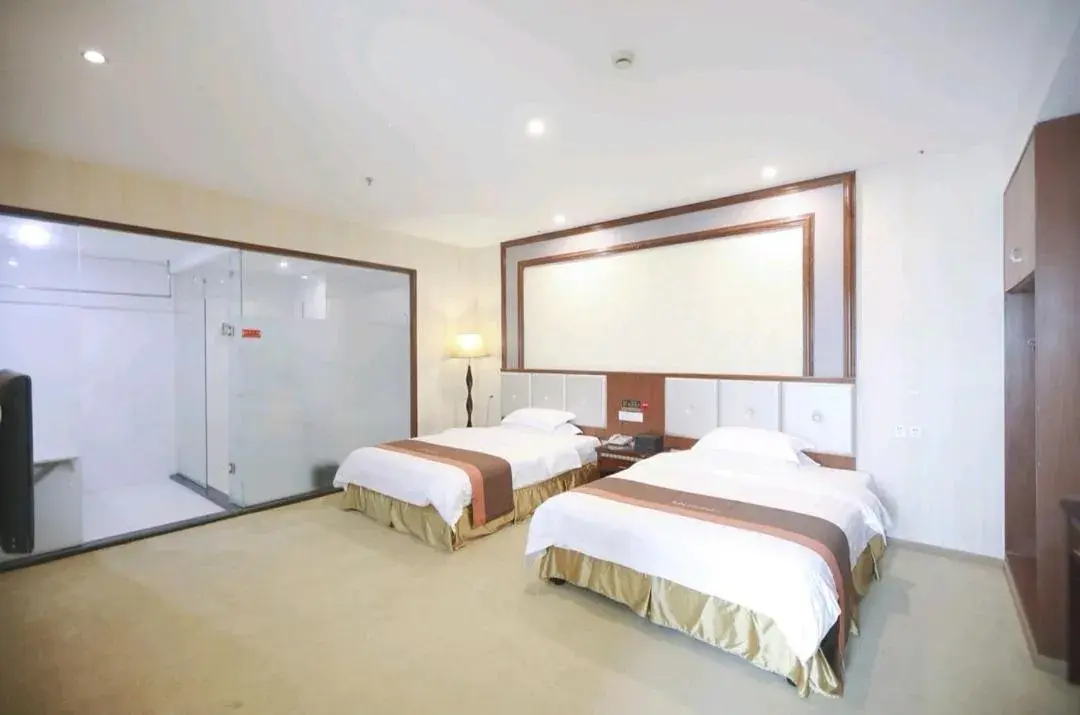 Bed in JUN Hotels Shenzhen Dapeng New District Kuiyong Street Bed in JUN Hotels Shenzhen Dapeng New District Kuiyong Street