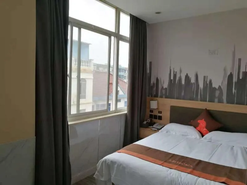 Bed in JUN Hotels Zhejiang Jiaxing Haiyan Qiyuan North Road