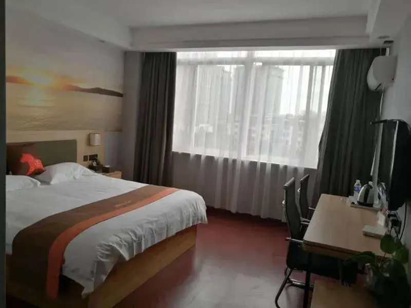 Bed in JUN Hotels Zhejiang Jiaxing Haiyan Qiyuan North Road Bed in JUN Hotels Zhejiang Jiaxing Haiyan Qiyuan North Road
