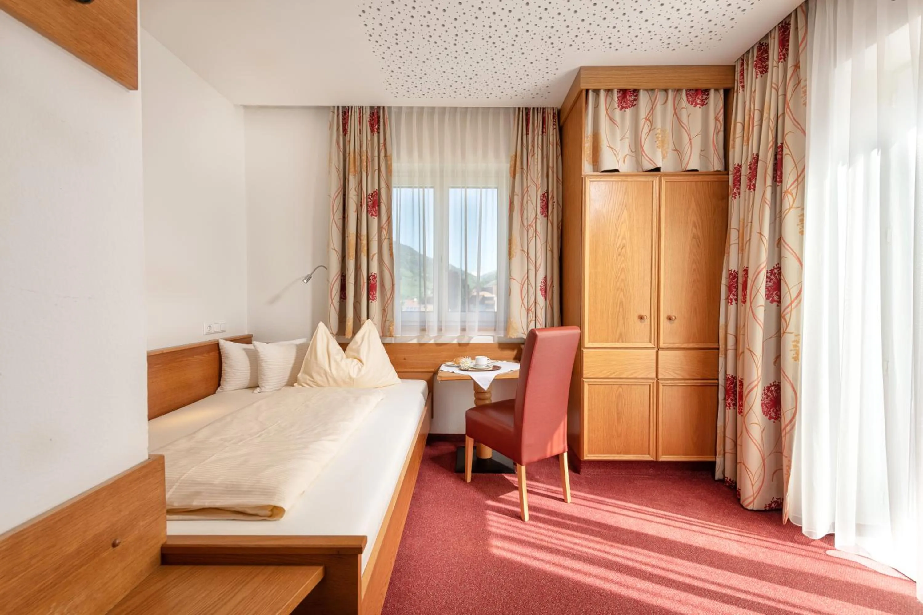 Photo of the whole room, Bed in Hotel Alpenhof - New Sauna Area