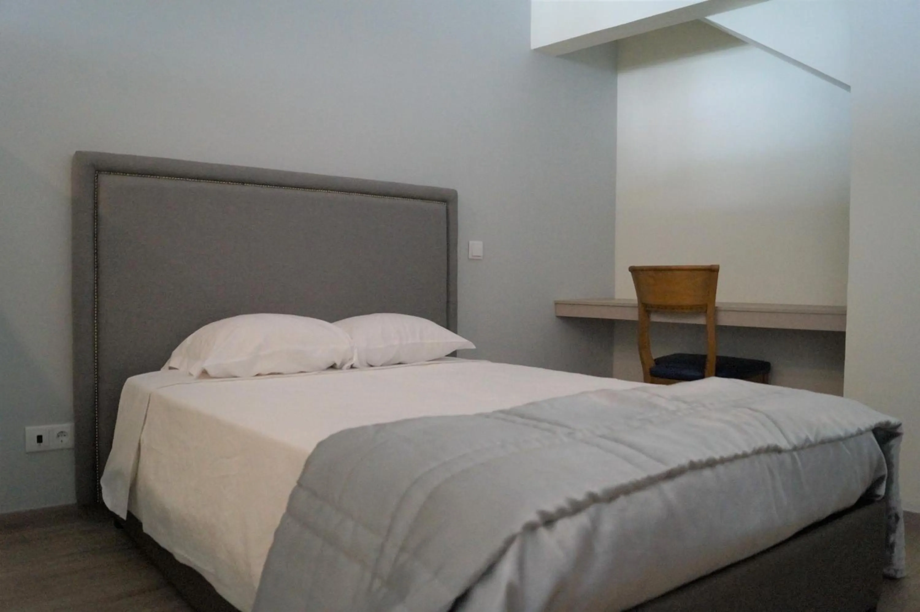 Bed in Angra Central Hotel