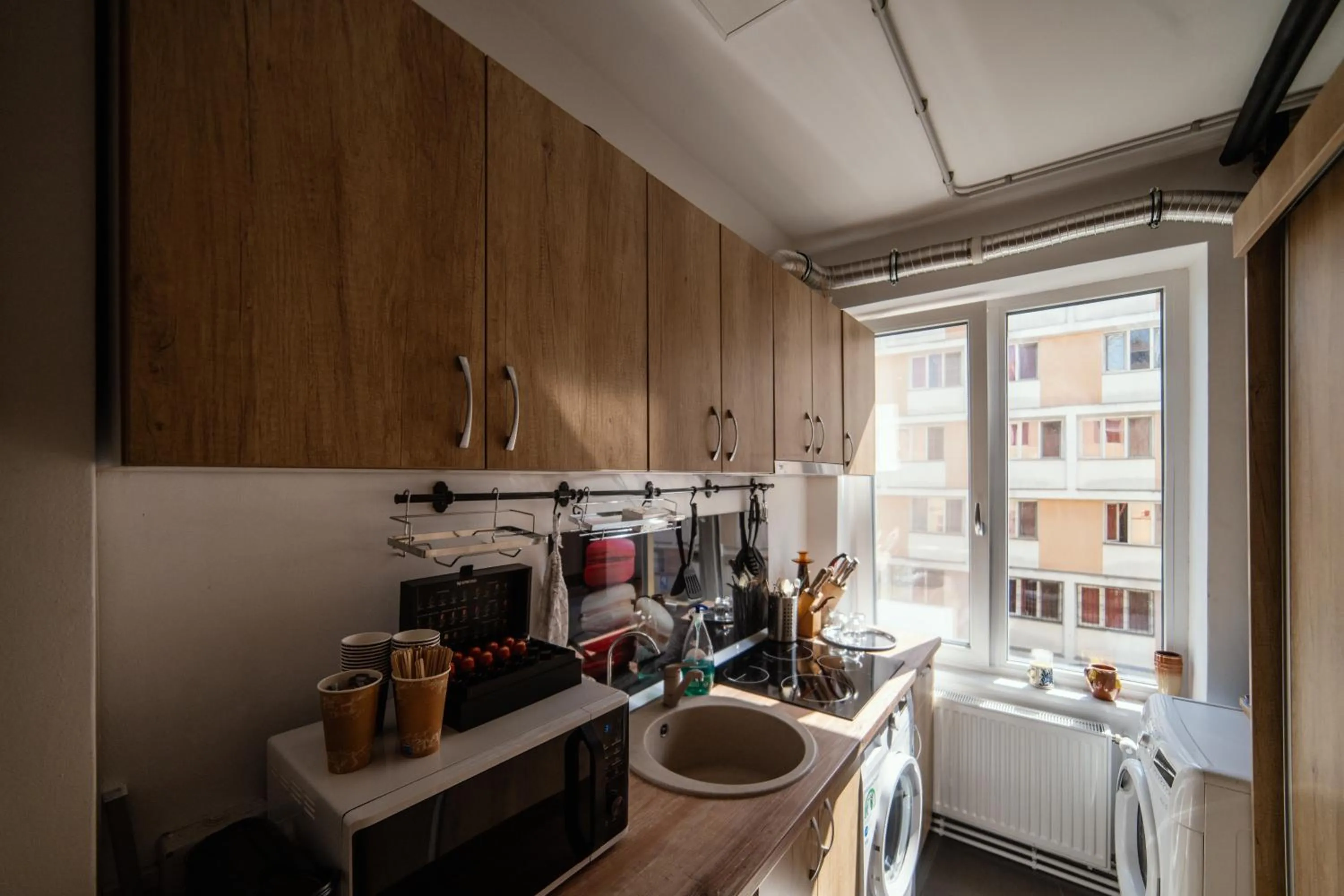 Communal kitchen in compleX living aparthotel