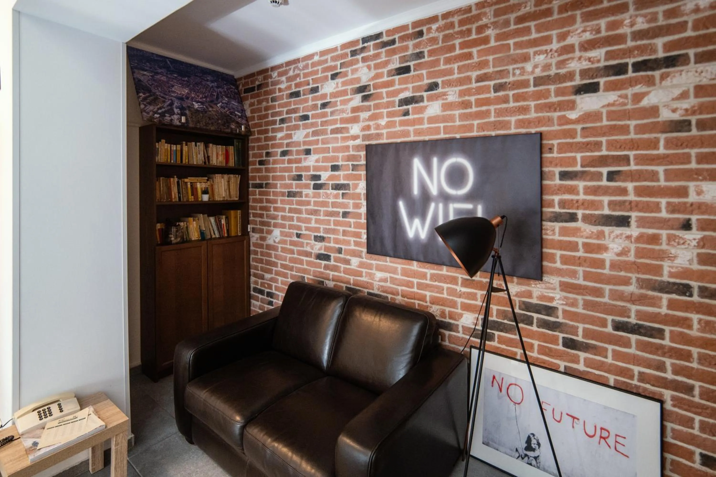 Library in compleX living aparthotel