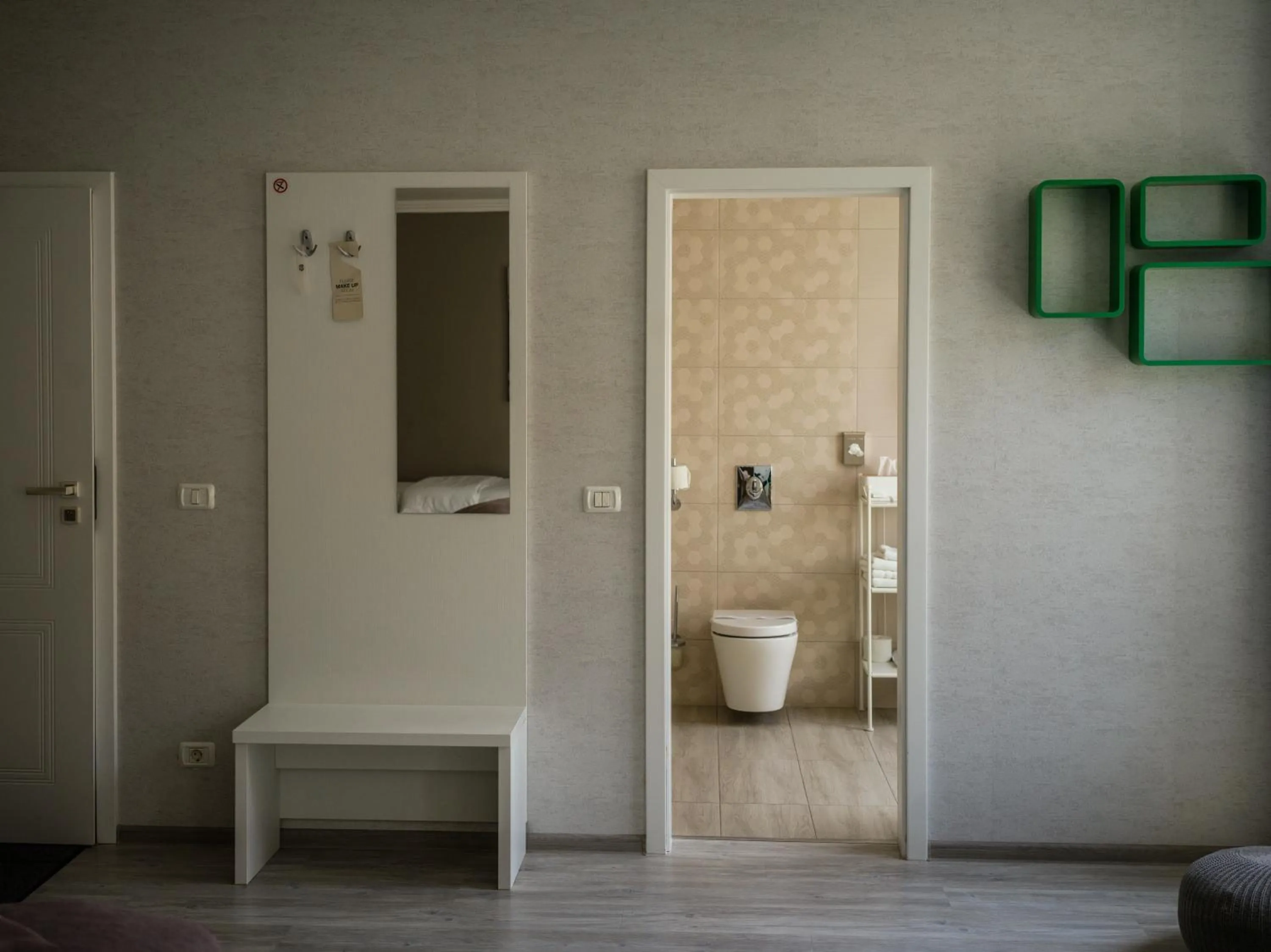 Toilet in compleX living aparthotel