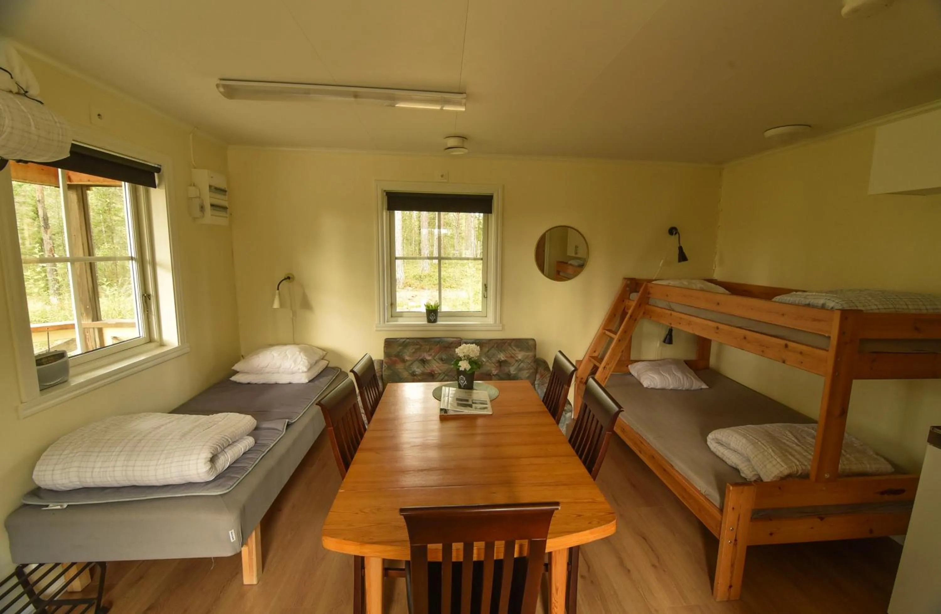 Living room, Bed in Big River Camp Hotel & Spa