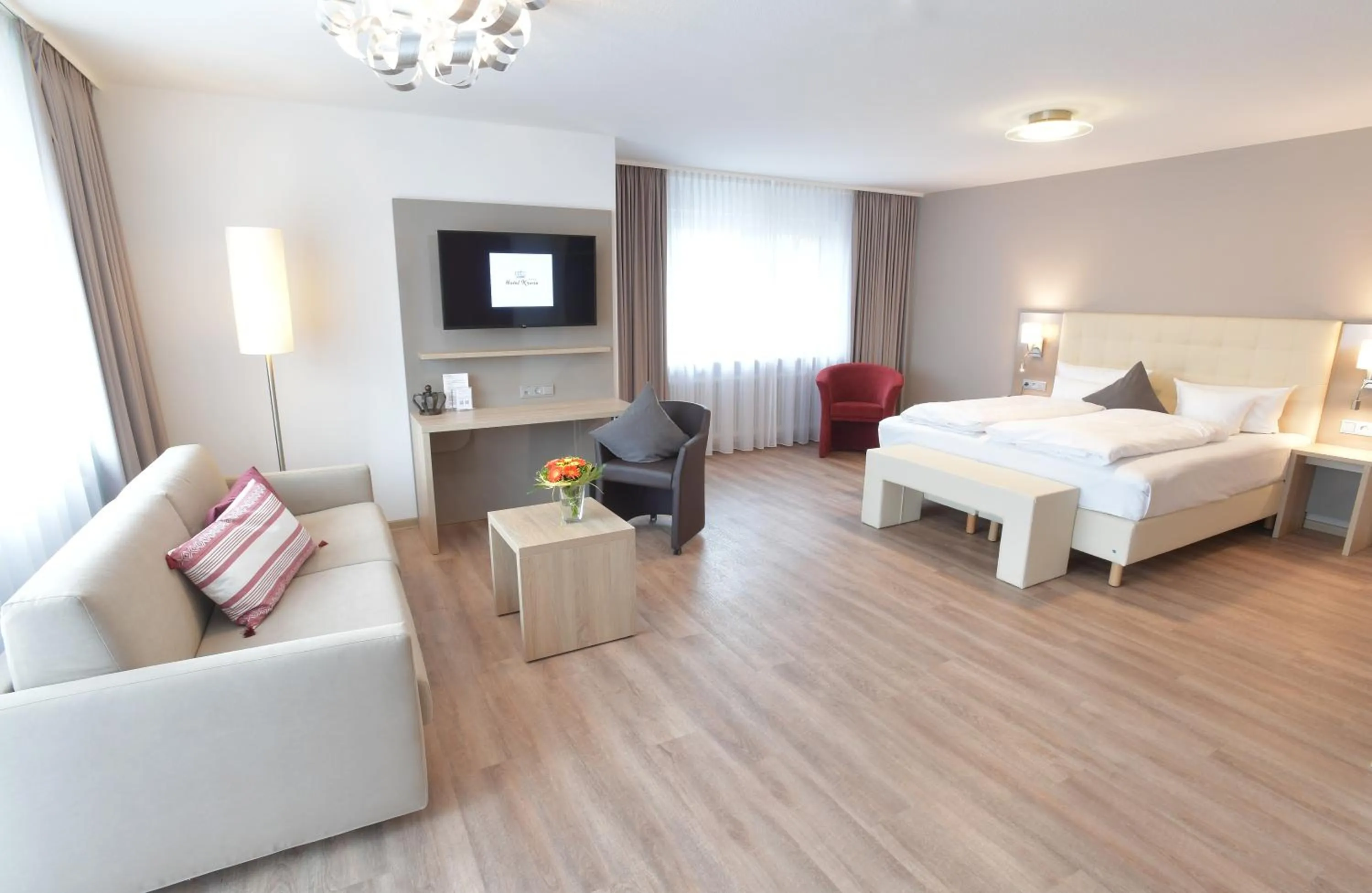 Living room, Bed in Hotel Krone
