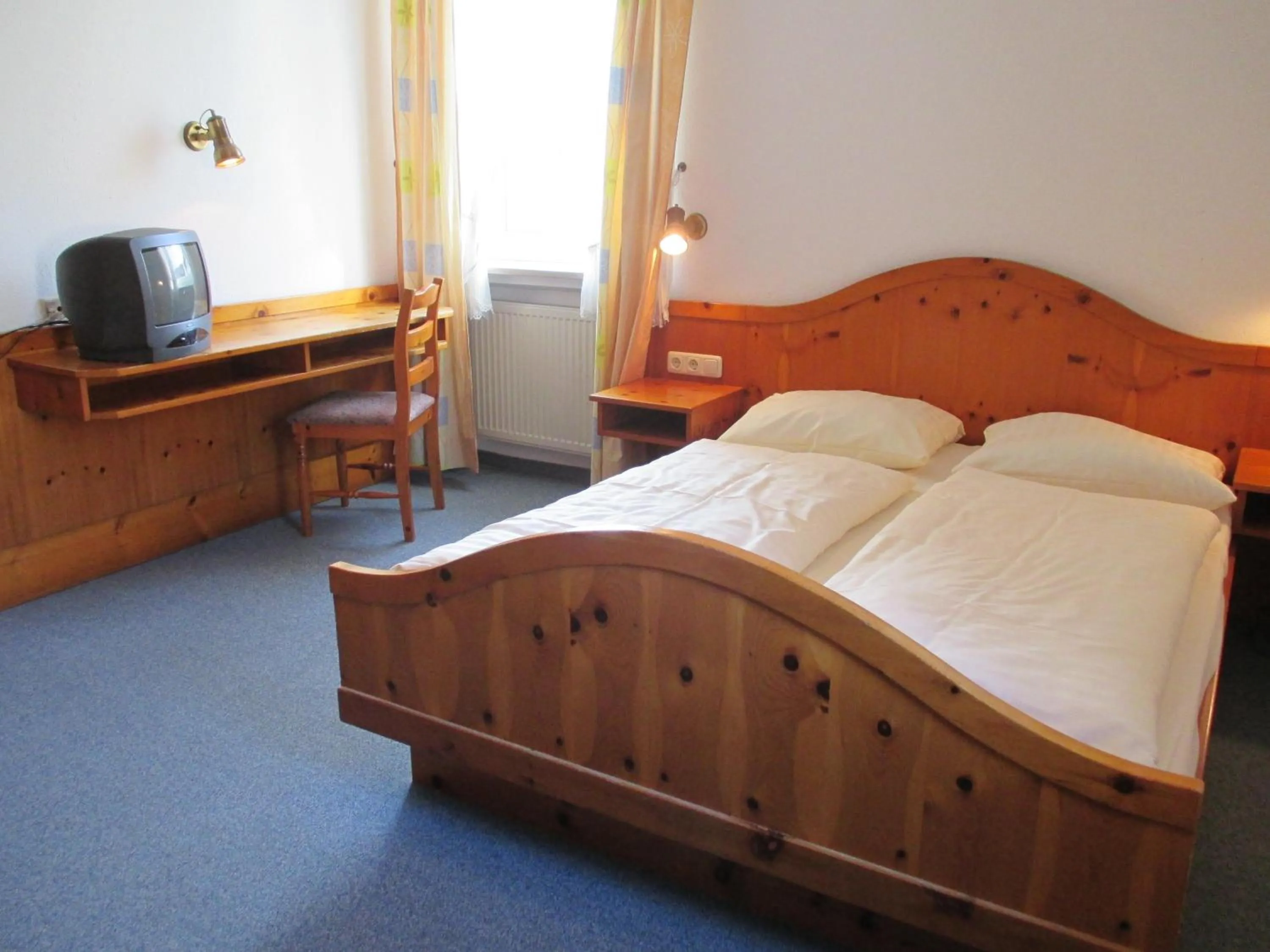 Photo of the whole room, Bed in Hotel & Gästehaus Krone