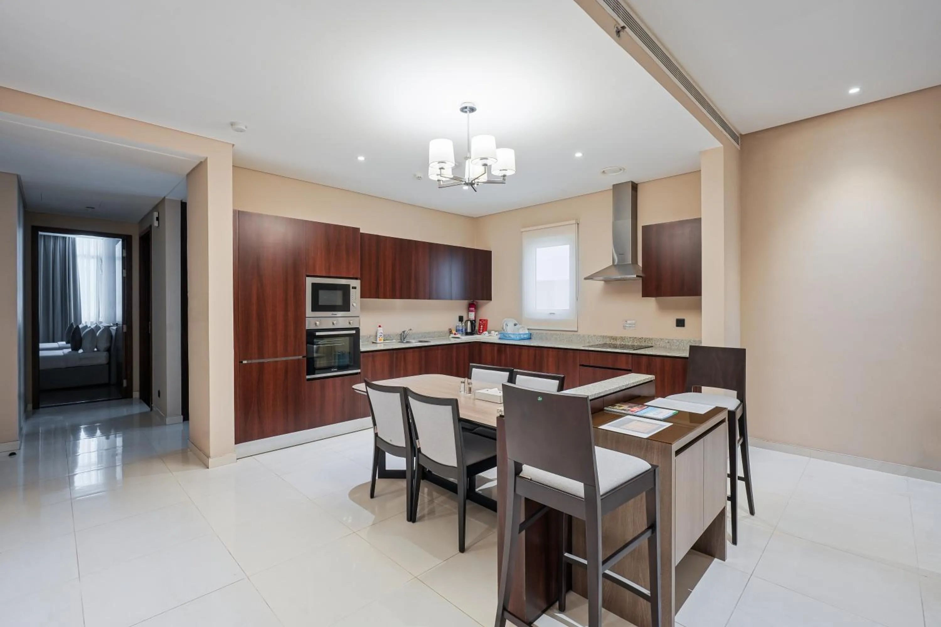 Kitchen or kitchenette in Eden Garden Hotel Apartment