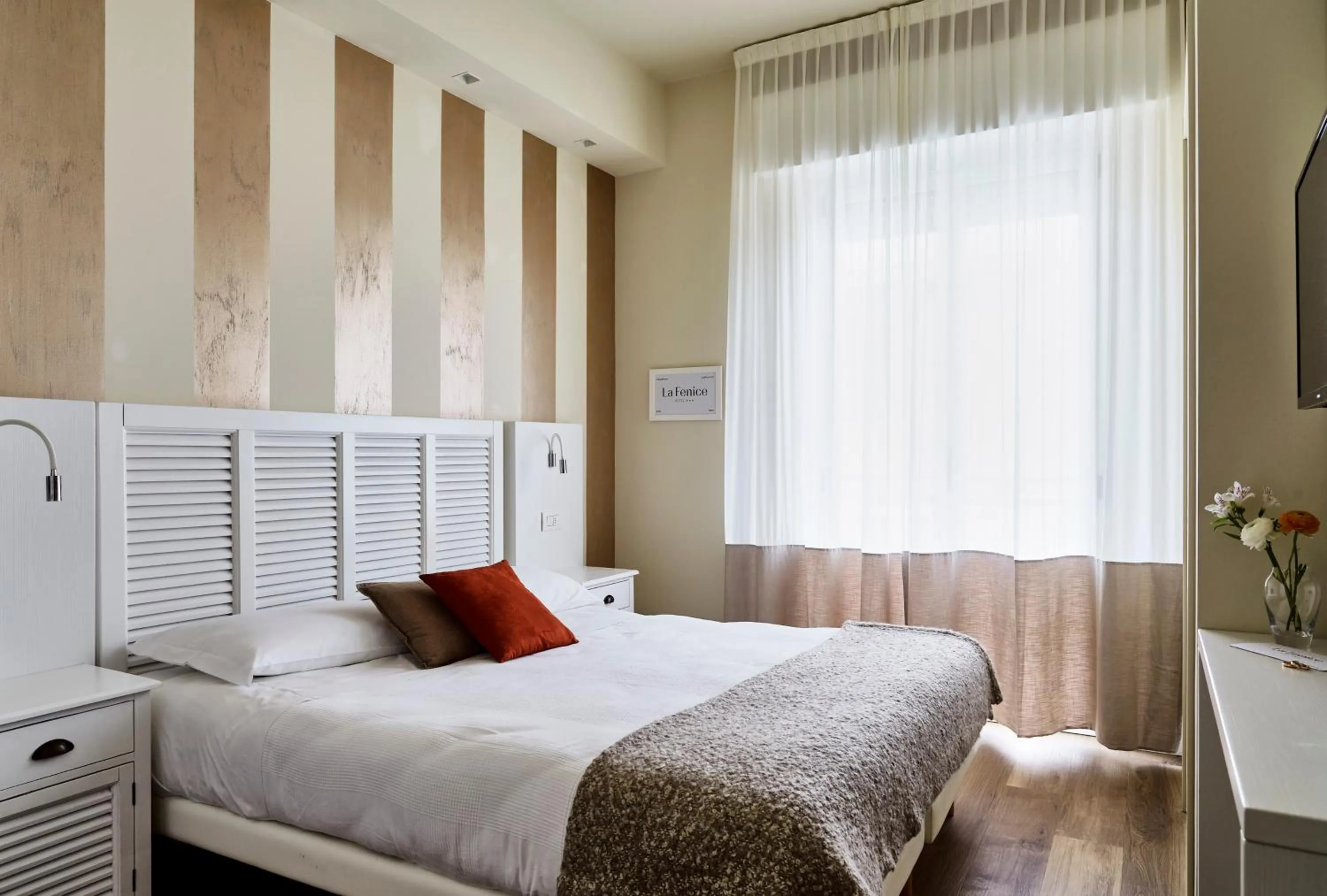 Bed in Hotel La Fenice