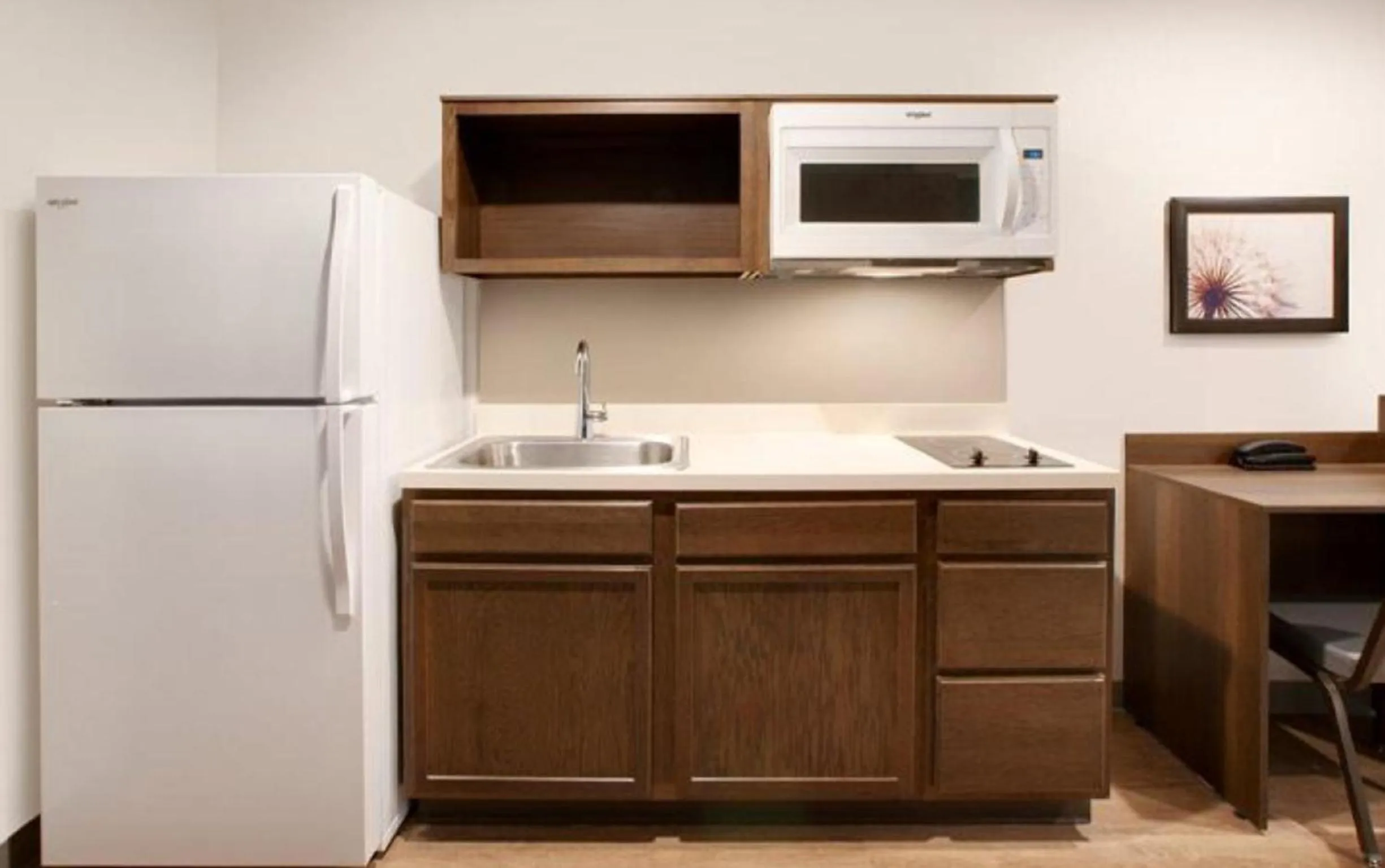 Kitchen or kitchenette in Woodspring Suites Atlanta Stockbridge