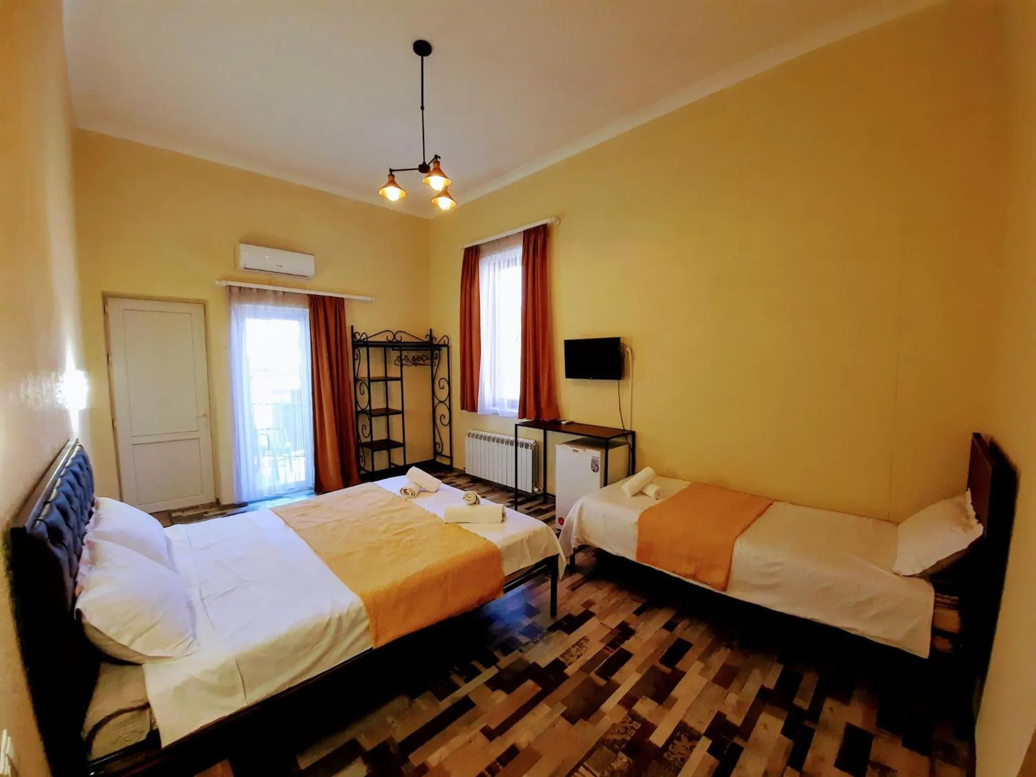Bed in Green Flower Boutique Hotel and Winery