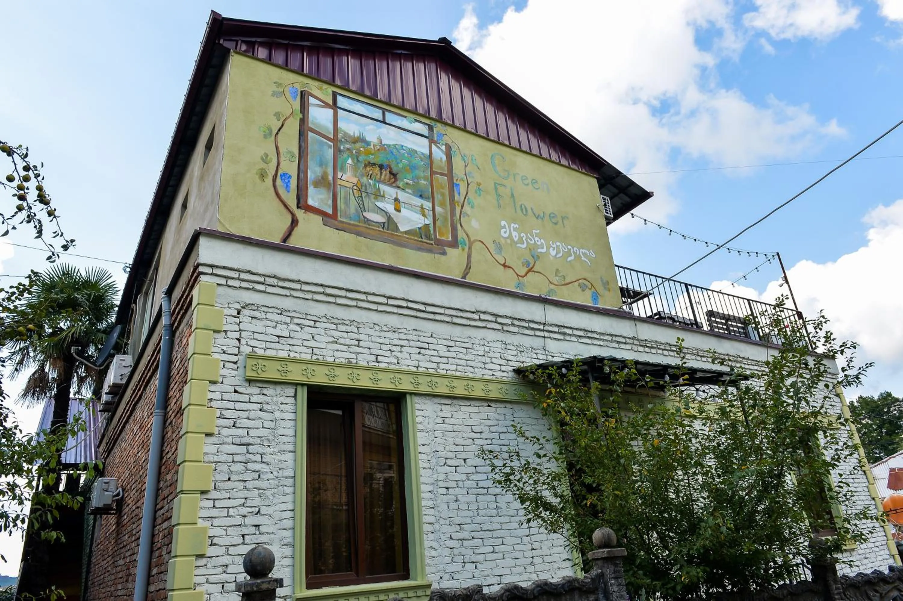 Property building in Green Flower Boutique Hotel and Winery