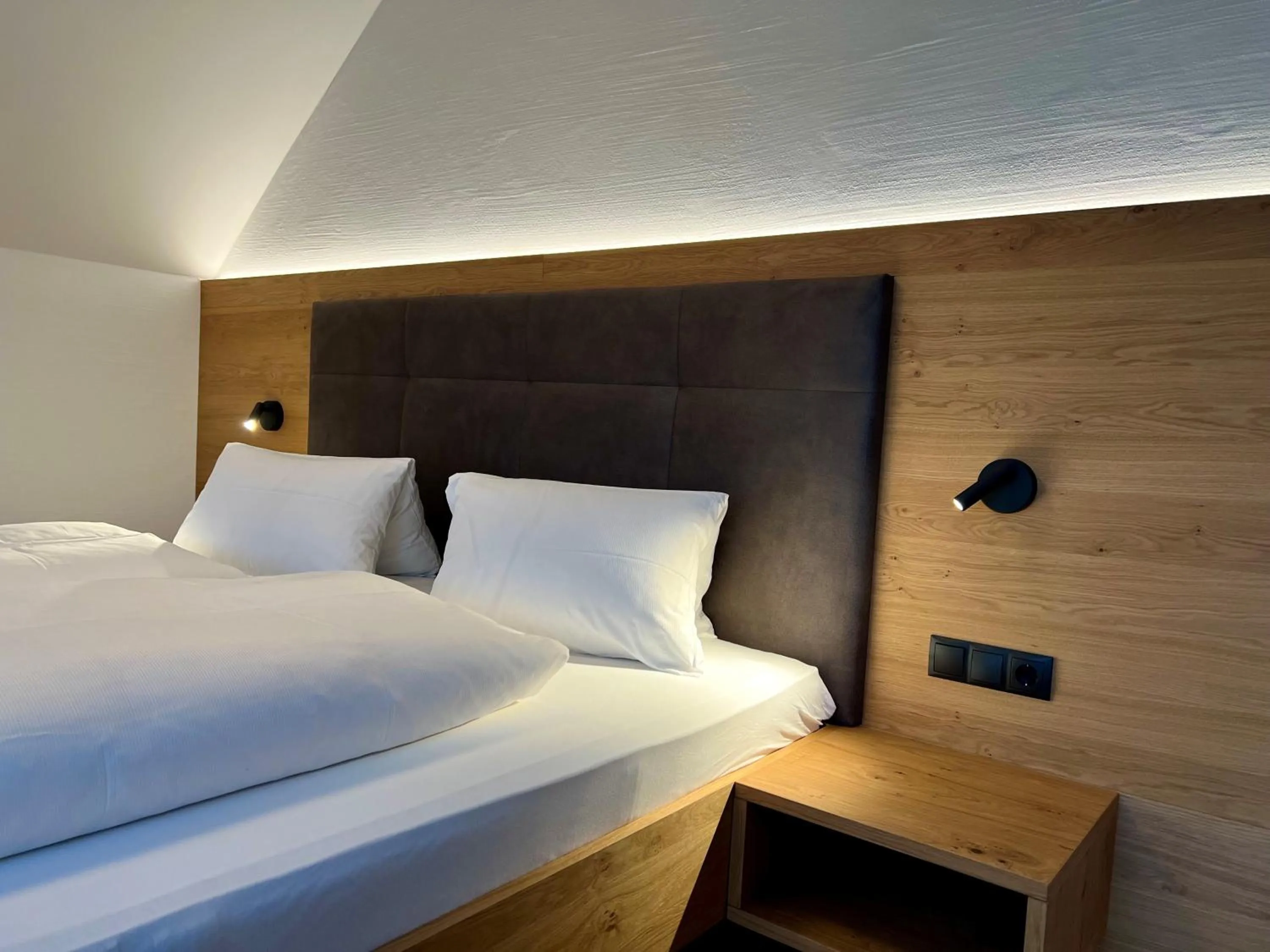 Bed in Gasthof Hotel Andlwirt