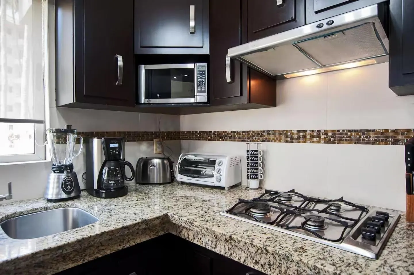 Kitchen or kitchenette in Marina Suites by Andiani Travel