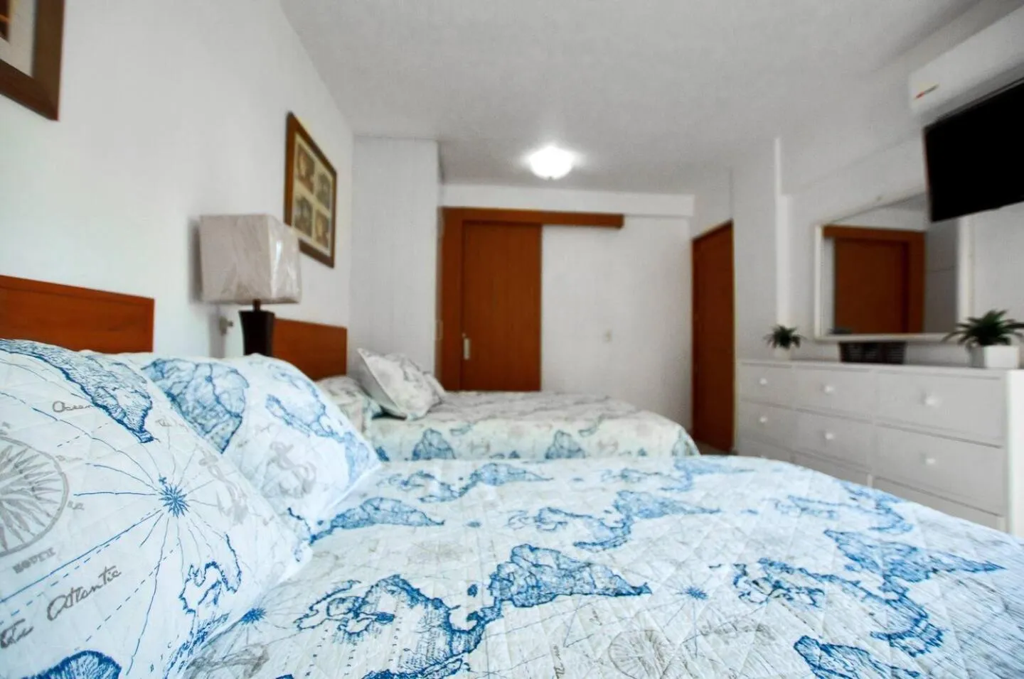 Bed in Marina Suites by Andiani Travel