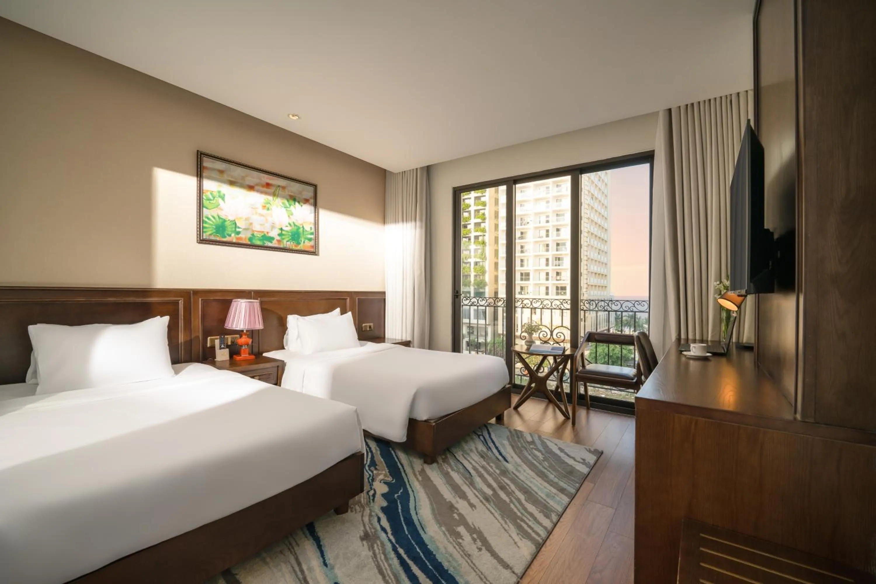 Bed in Golden Lotus Hotel Da Nang - Rooftop Bar Sea View