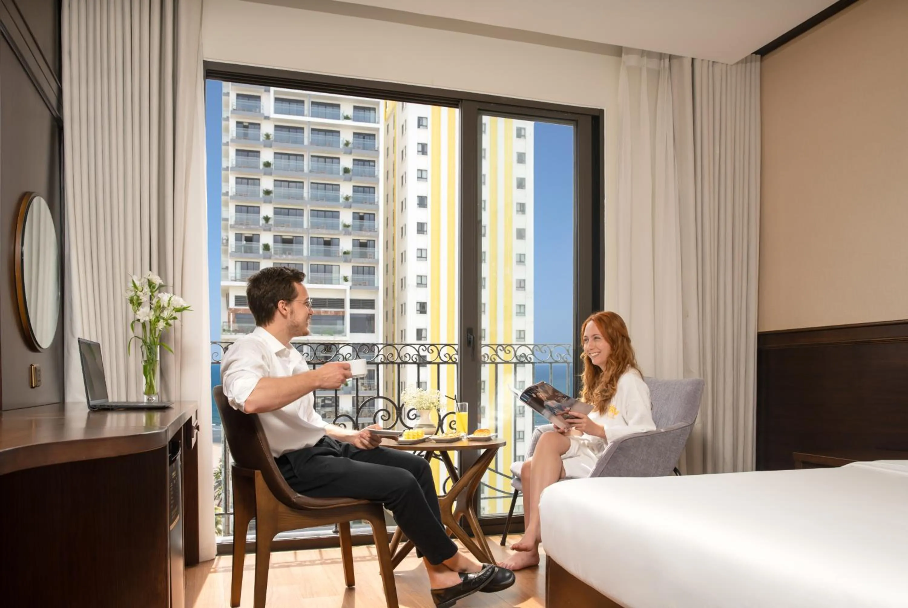 Bed in Golden Lotus Hotel Da Nang - Rooftop Bar Sea View