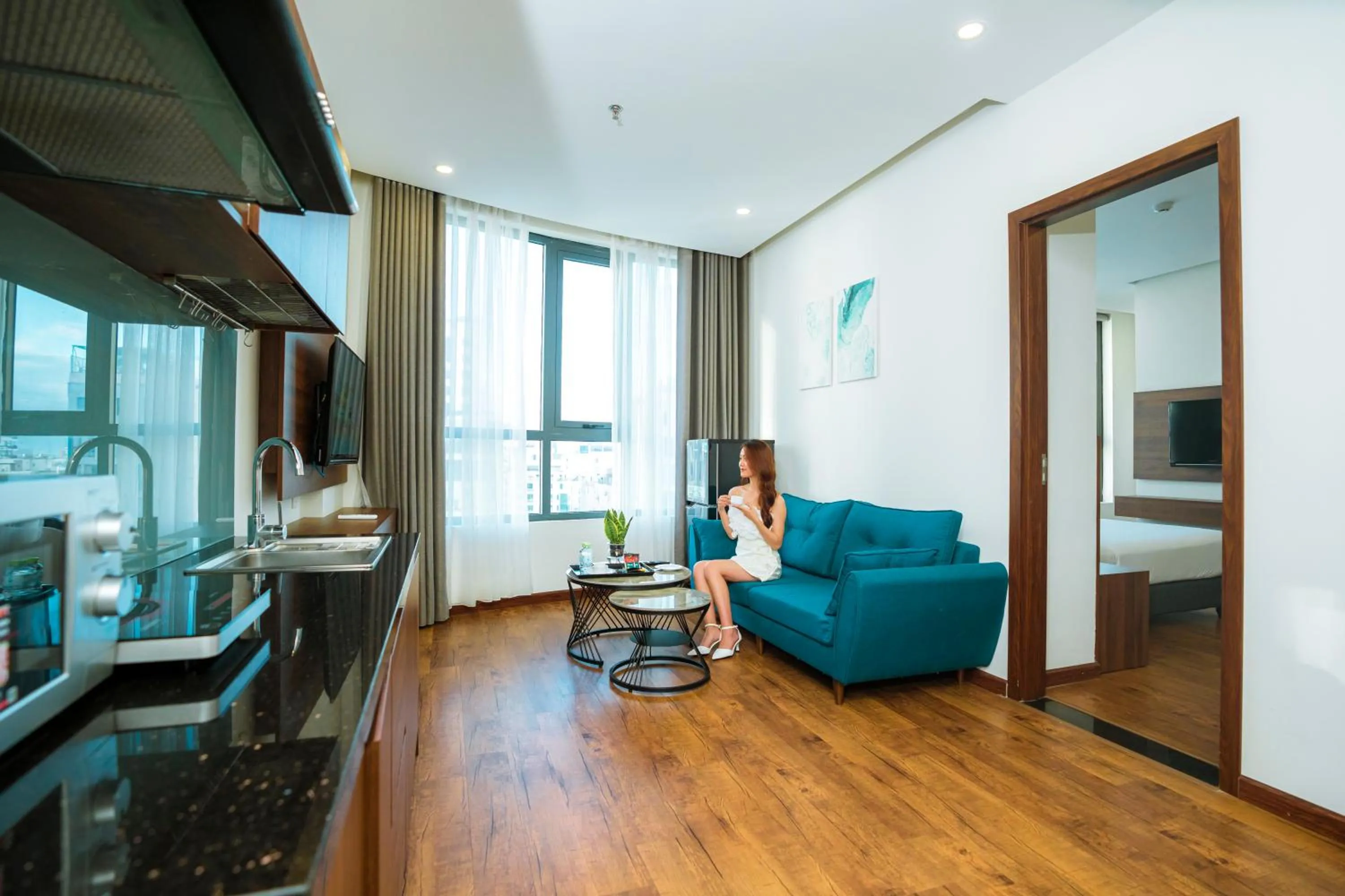 Living room, Bed in Capecia Danang Hotel and Apartment