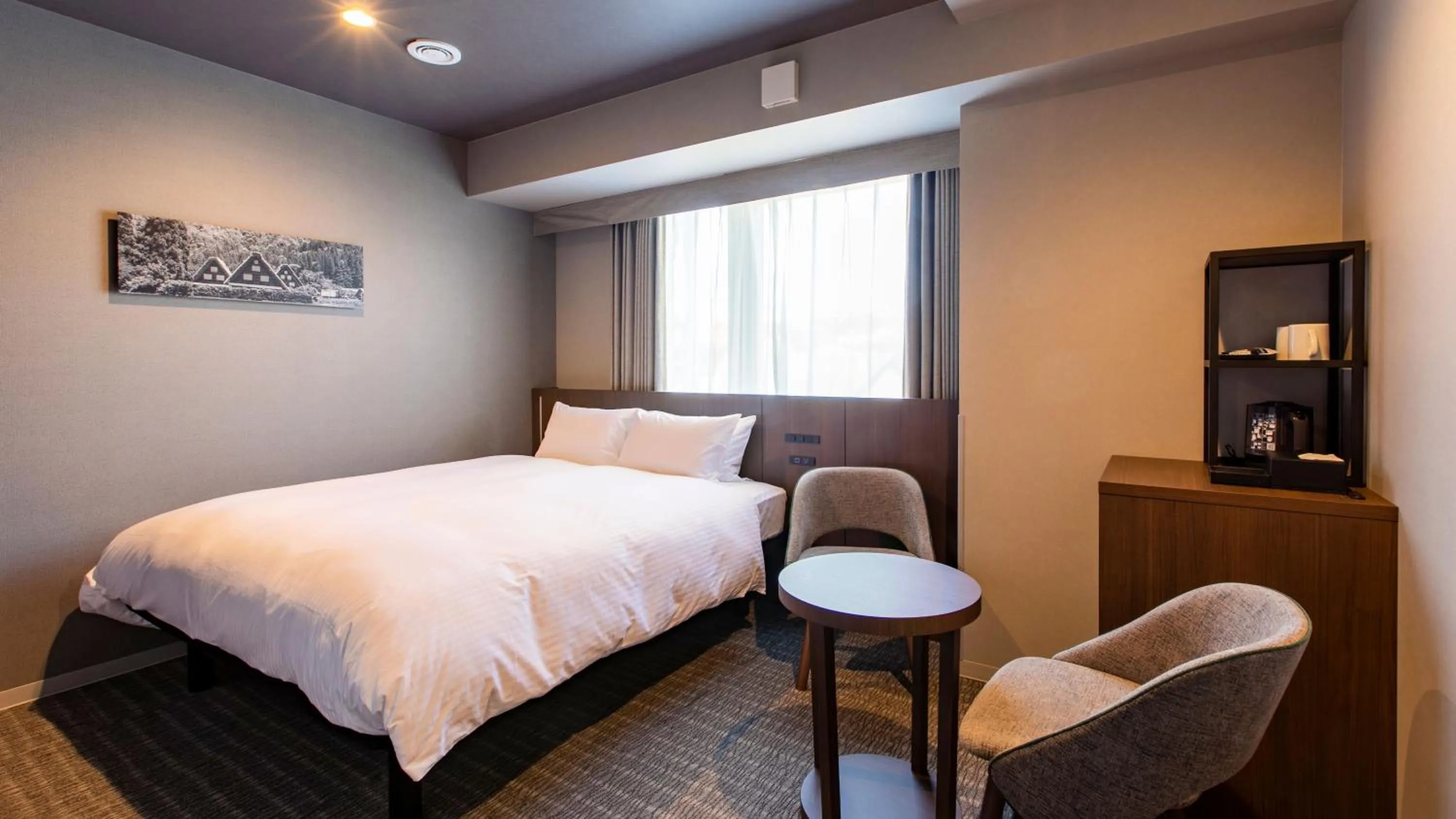 Photo of the whole room, Bed in KOKO HOTEL Hidatakayama - formaly Hotel Wing Hida Takayama