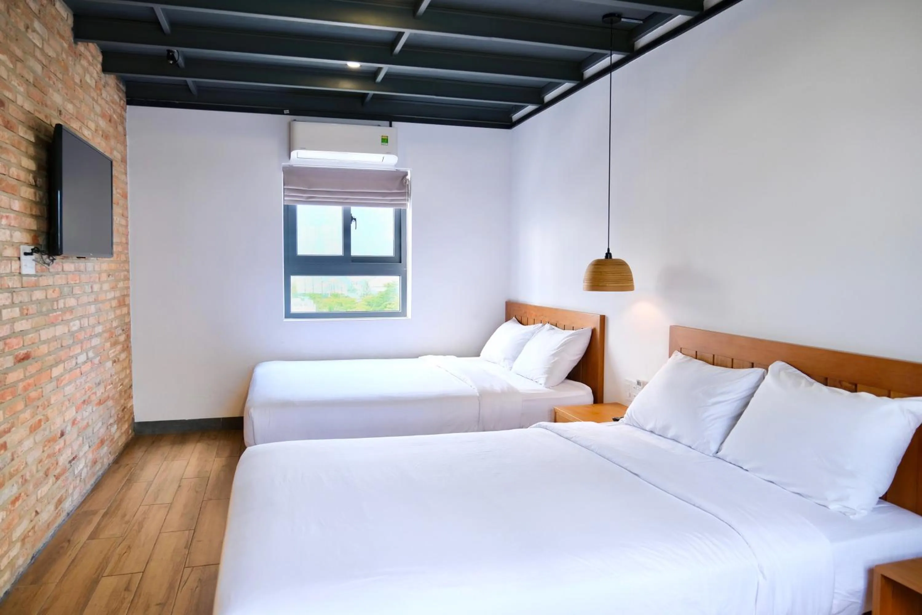 Bed in Coast House Boutique Hotel