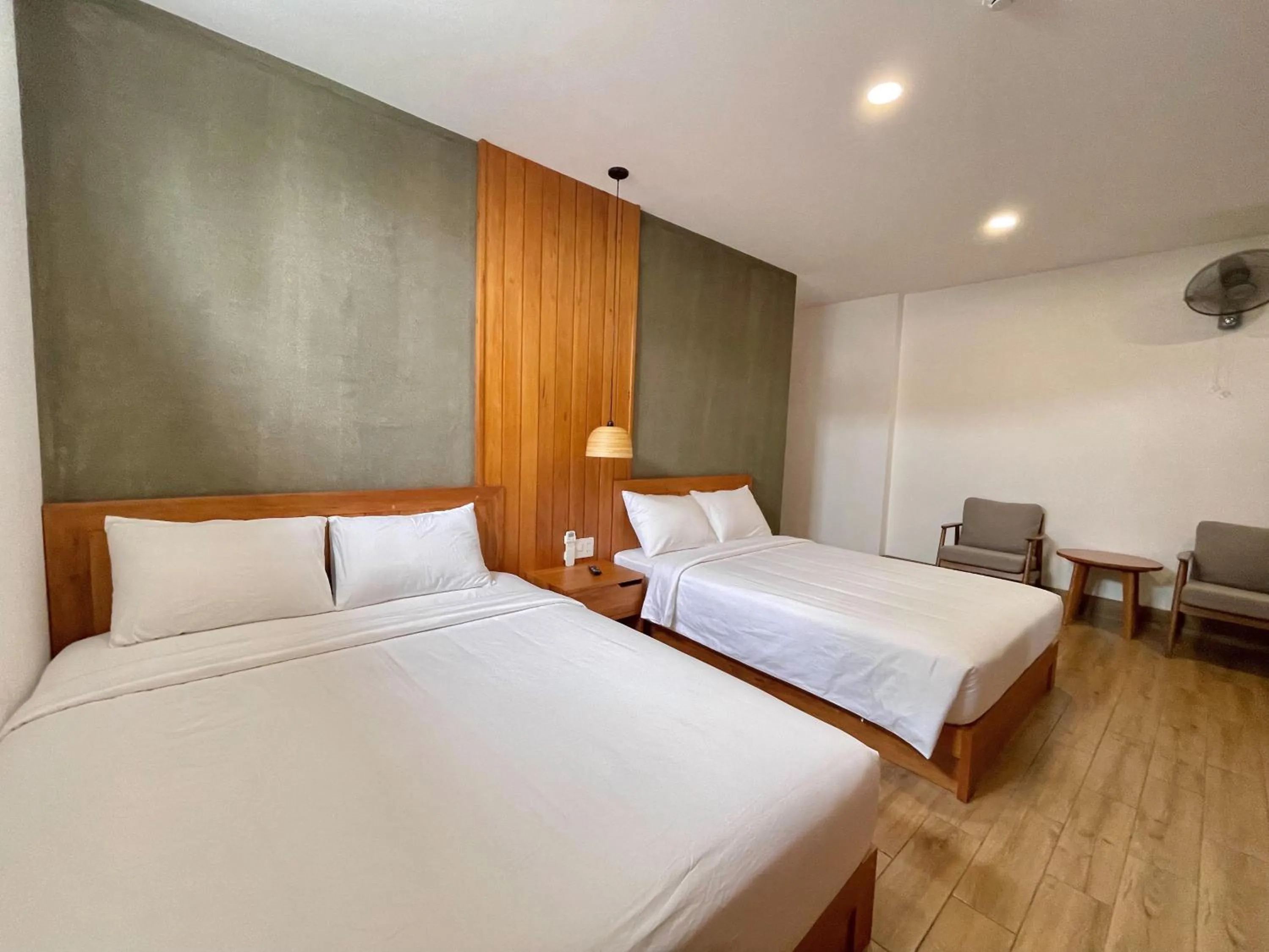 Bed in Coast House Boutique Hotel