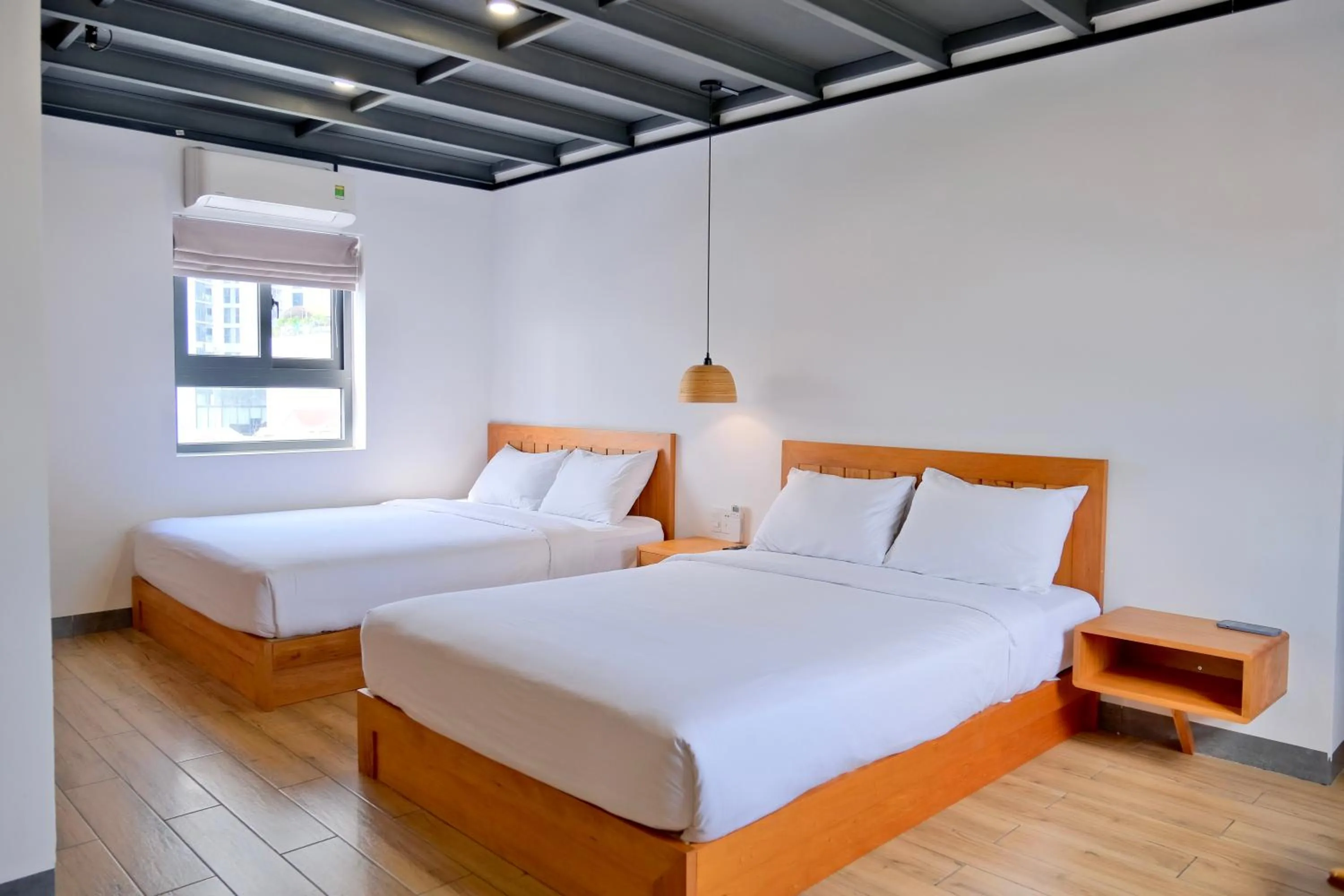 Bed in Coast House Boutique Hotel