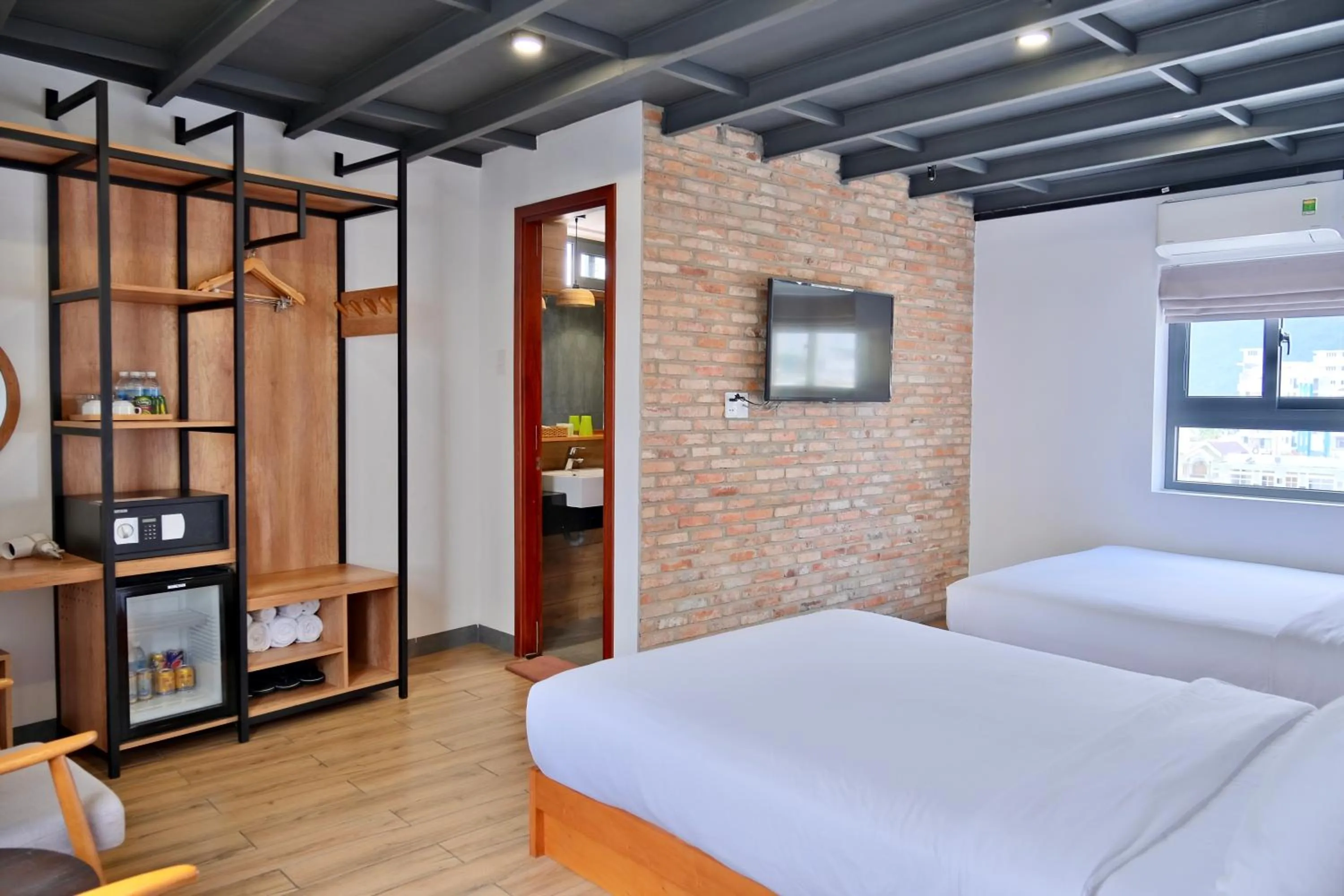 Bed in Coast House Boutique Hotel