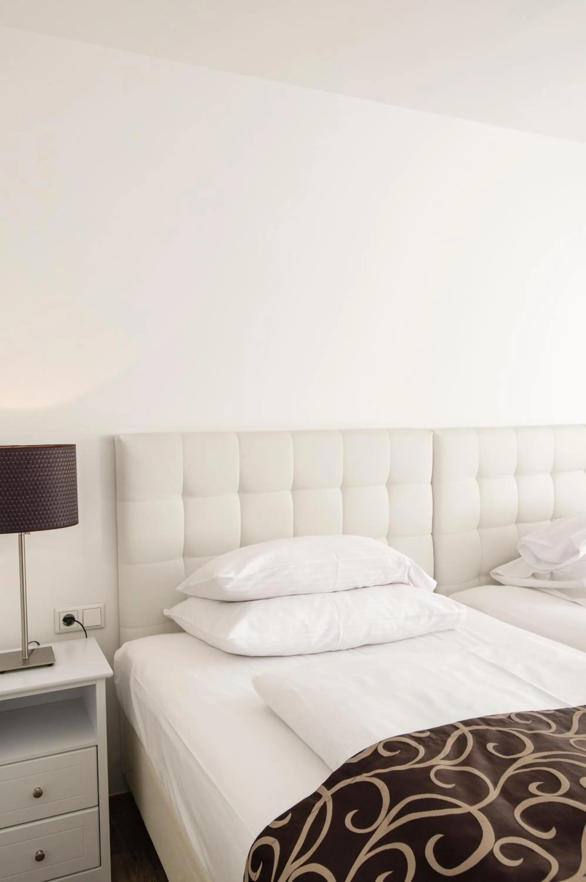 Bed in Werners Boutique Hotel