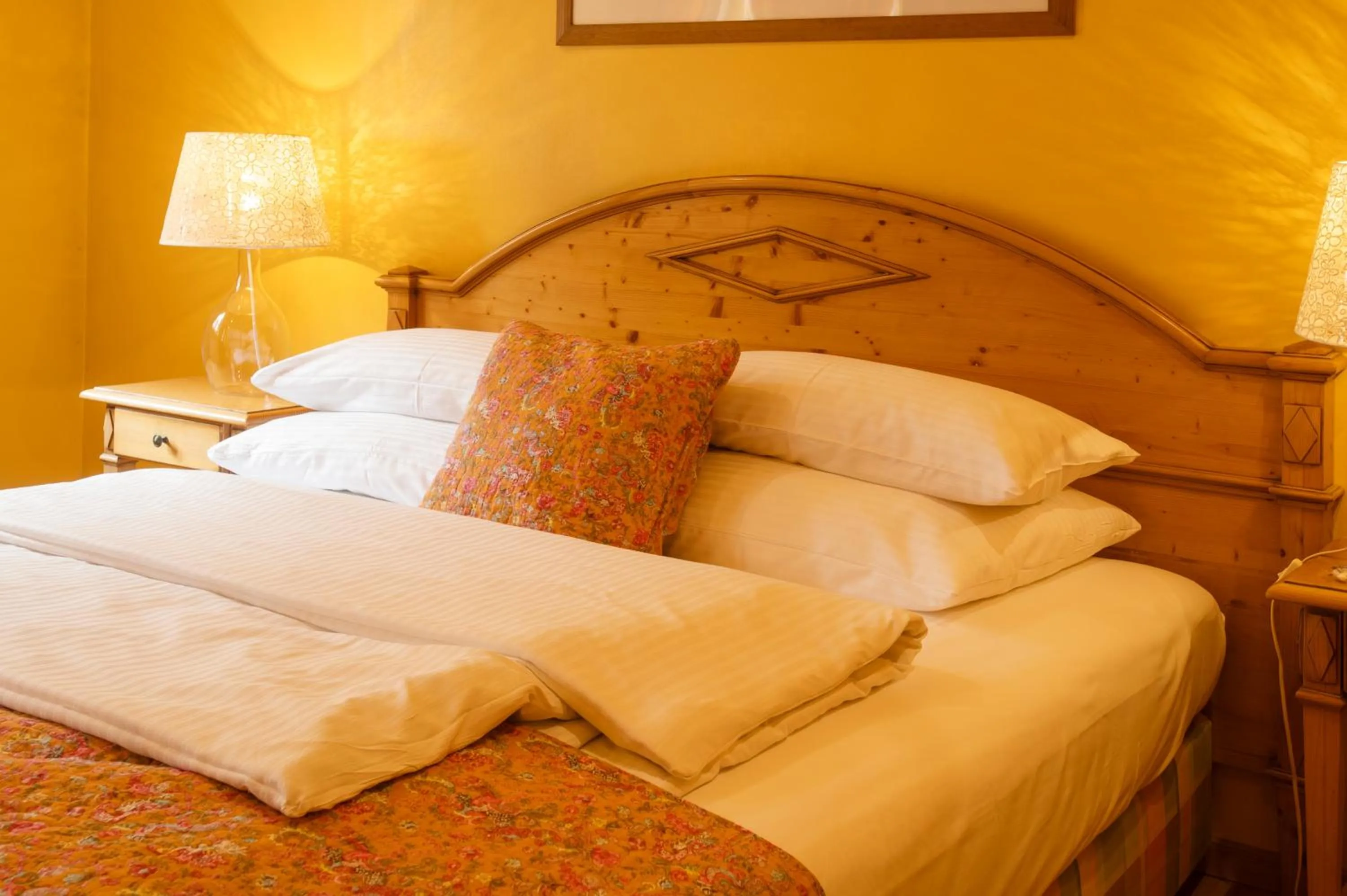Bed in Werners Boutique Hotel