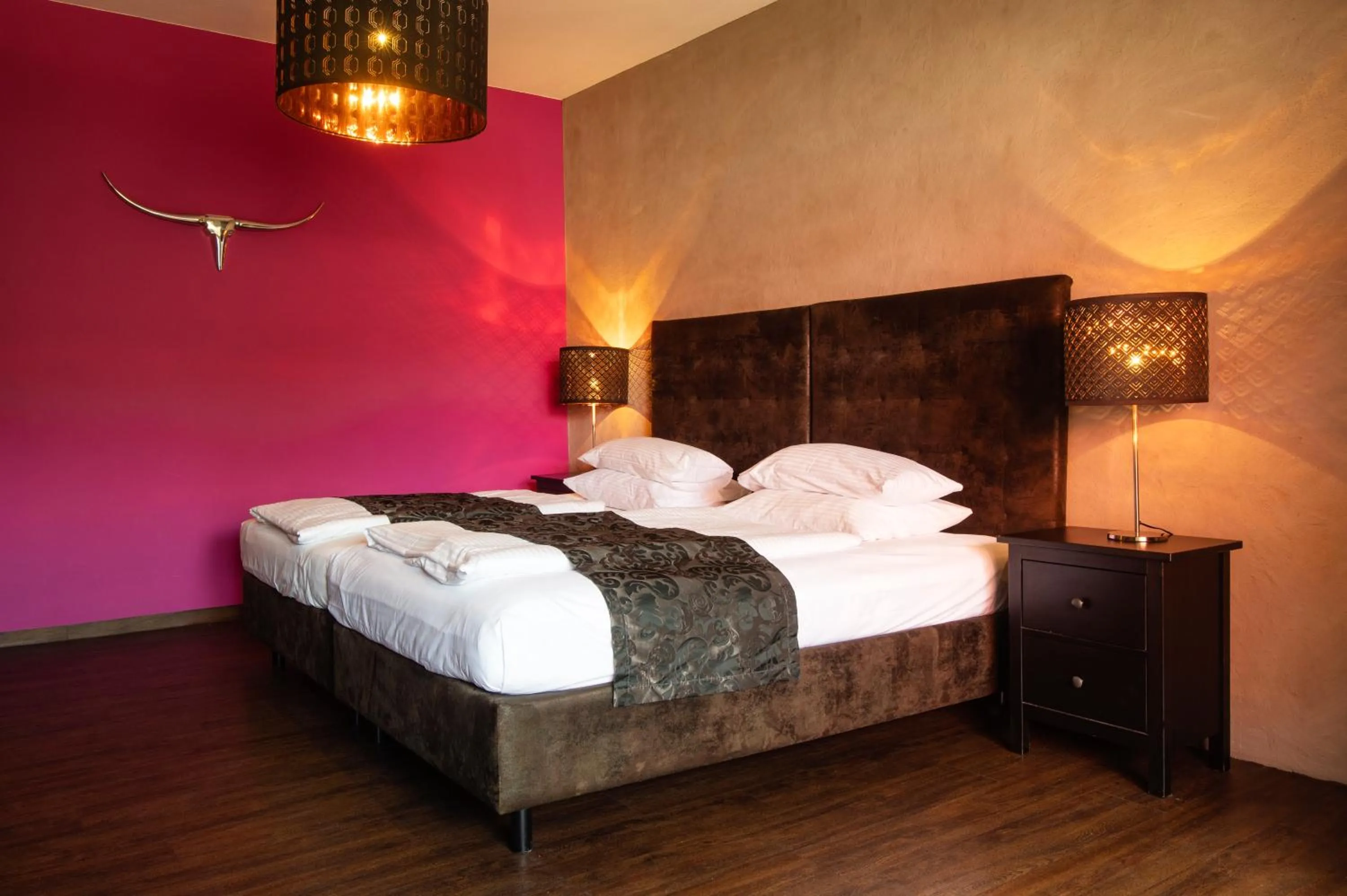 Bed in Werners Boutique Hotel