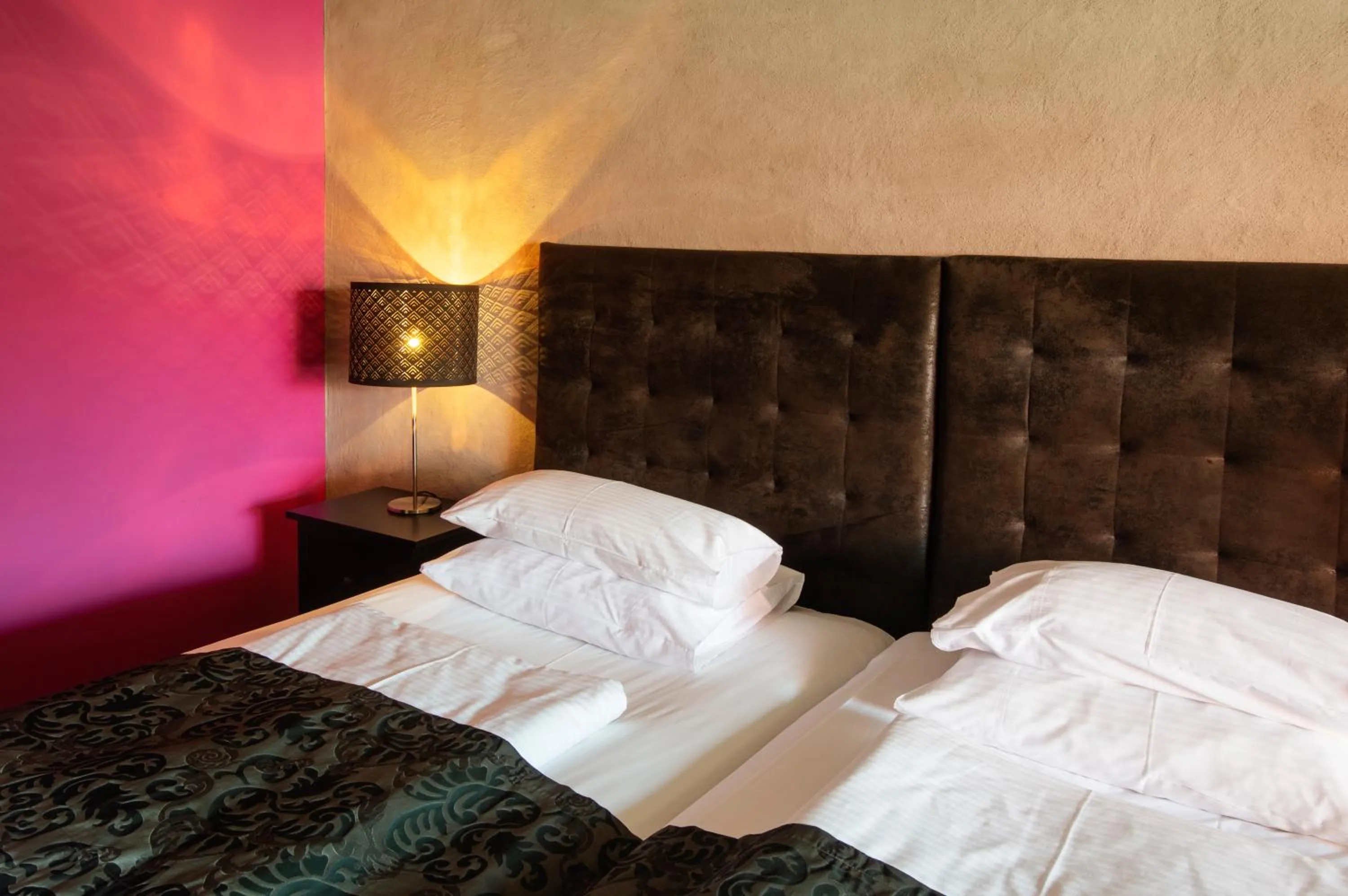 Bed in Werners Boutique Hotel