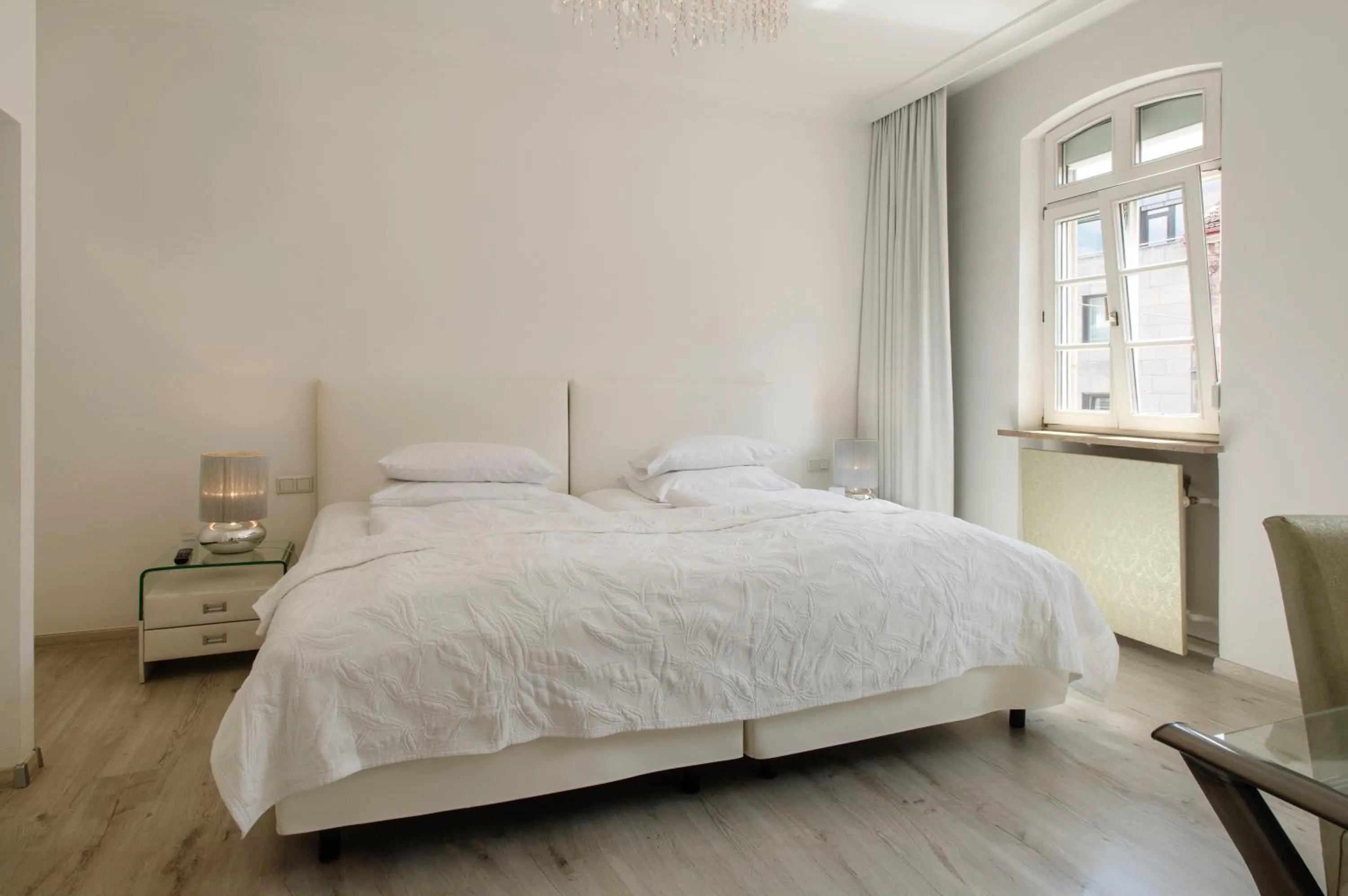 Bed in Werners Boutique Hotel