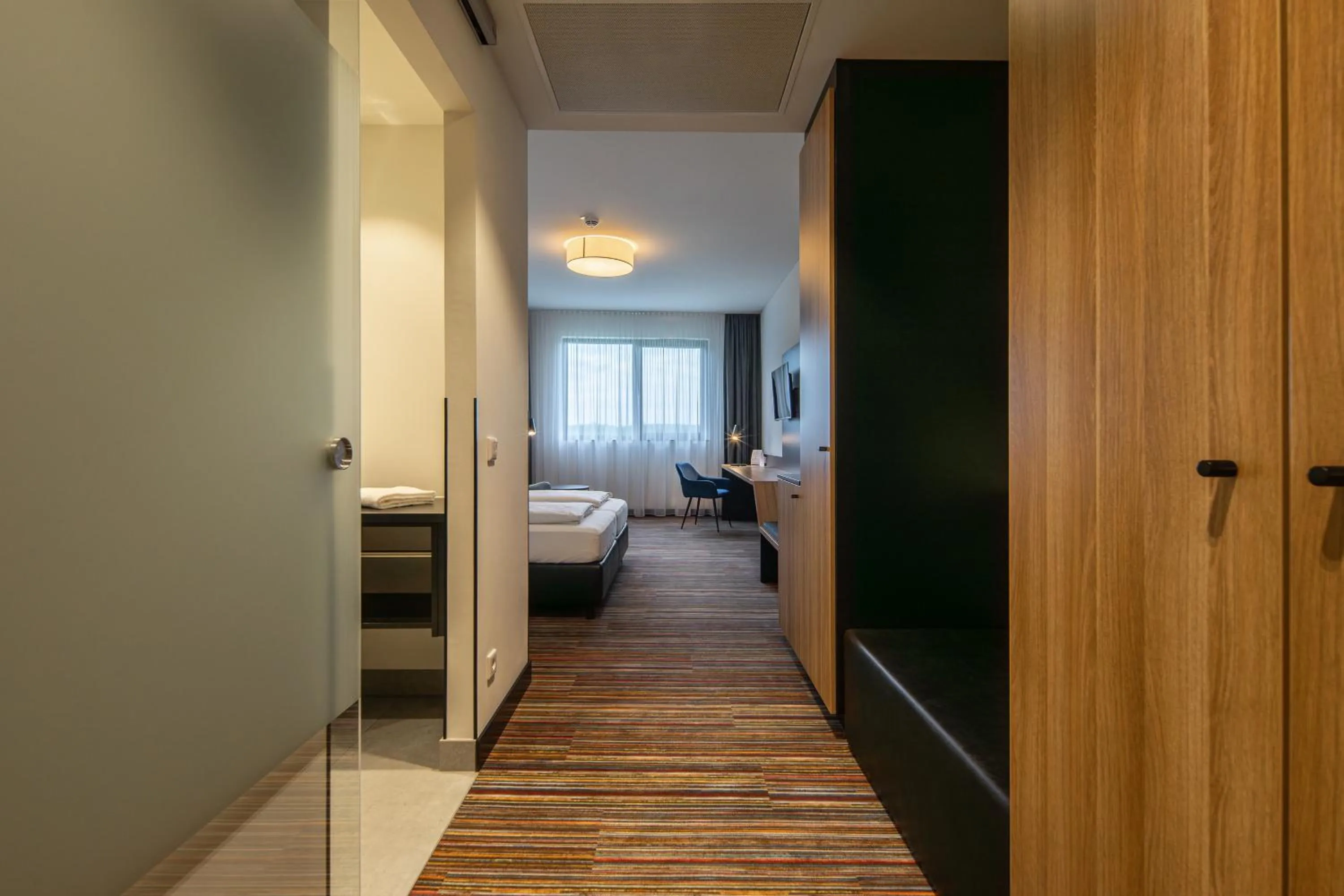 Photo of the whole room, Bed in N+S City Hotel Neumarkt