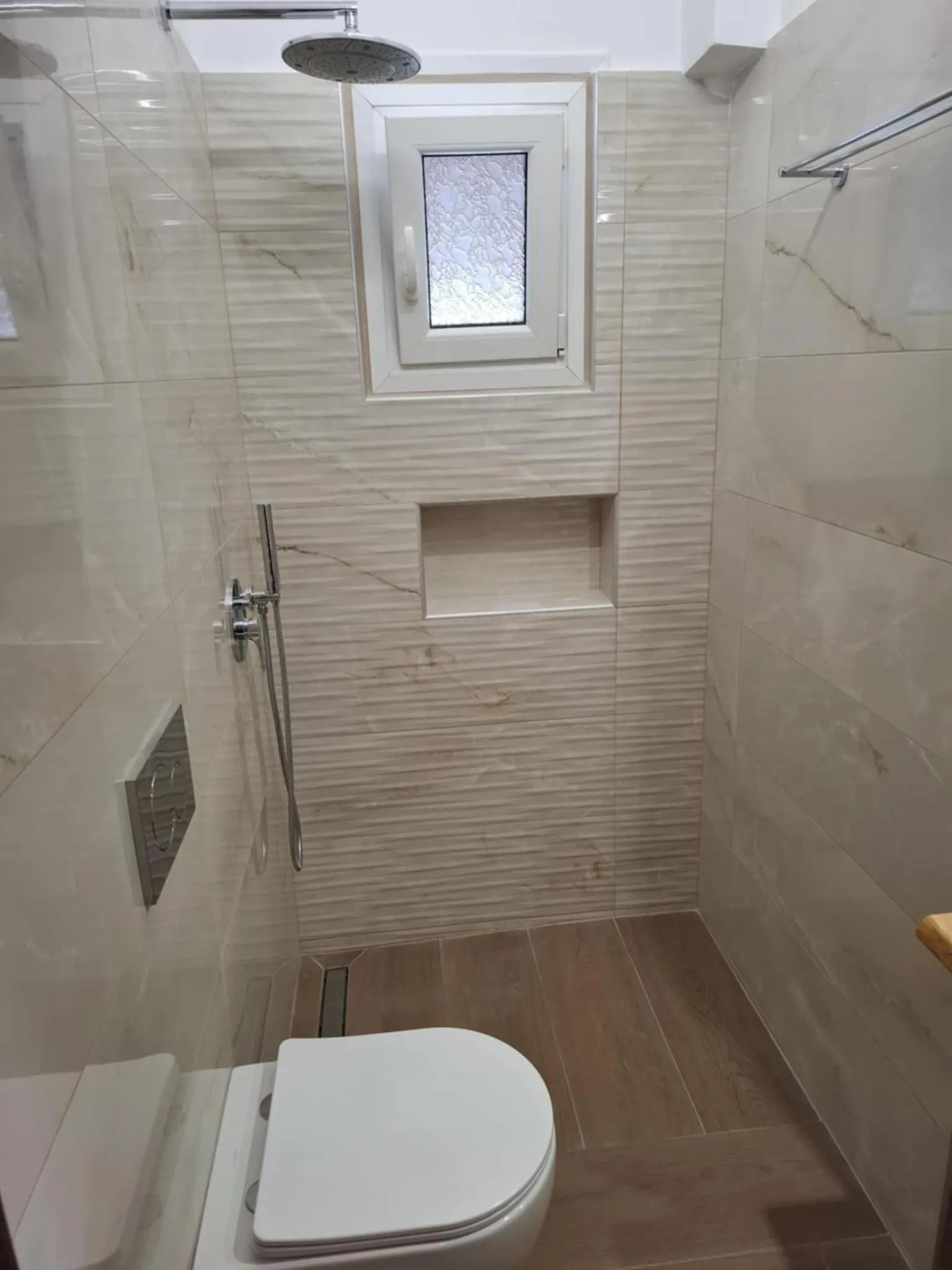 Bathroom in Lefteris Rooms