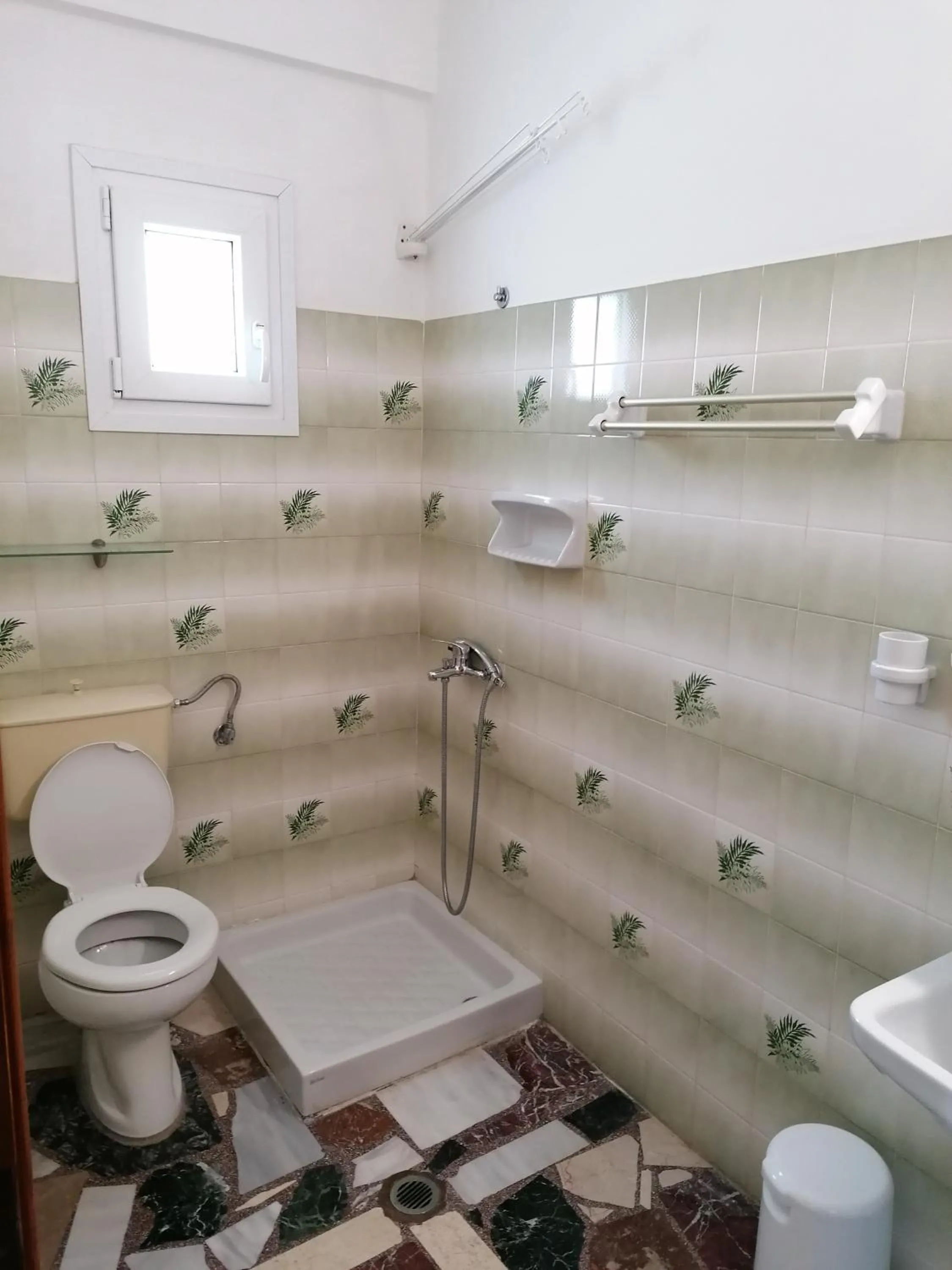 Bathroom in Lefteris Rooms
