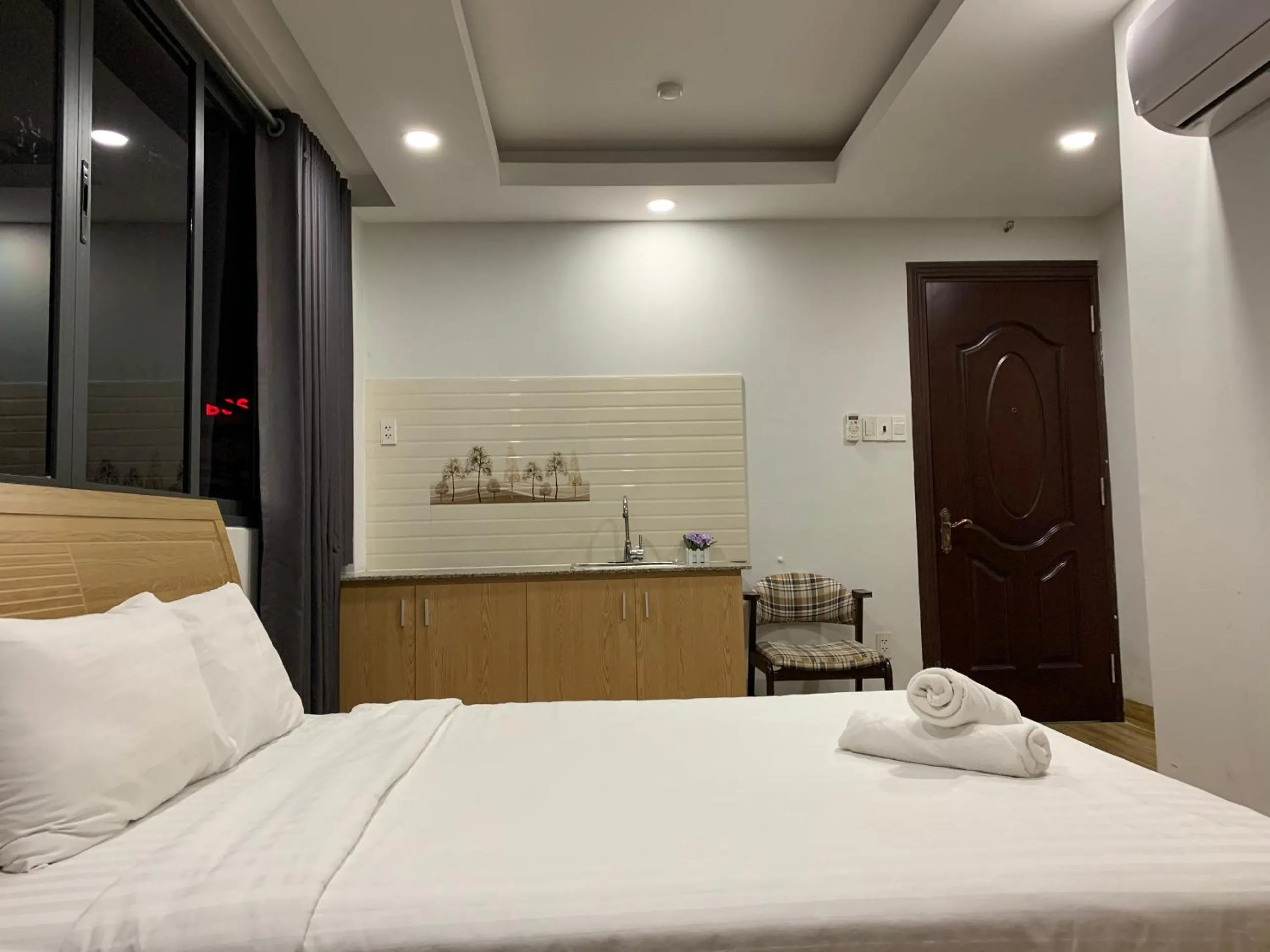 Photo of the whole room, Bed in The Lumiere near Tan Son Nhat Airport