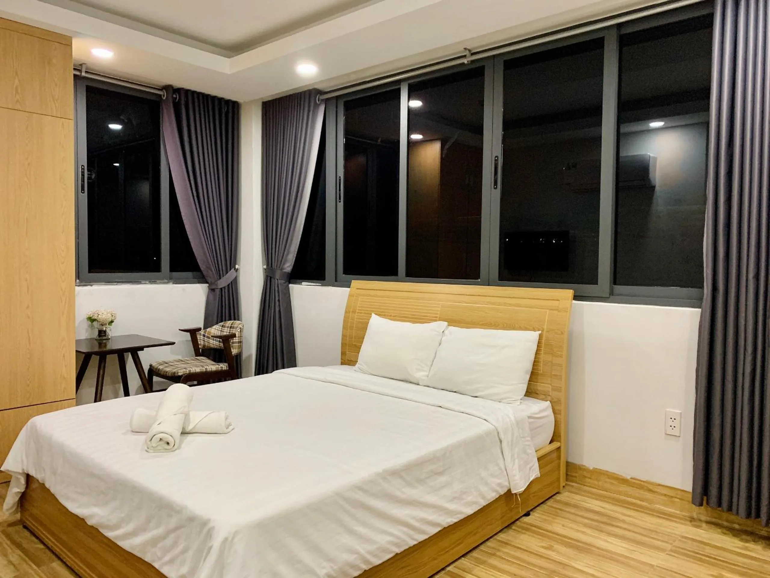 Photo of the whole room, Bed in The Lumiere near Tan Son Nhat Airport
