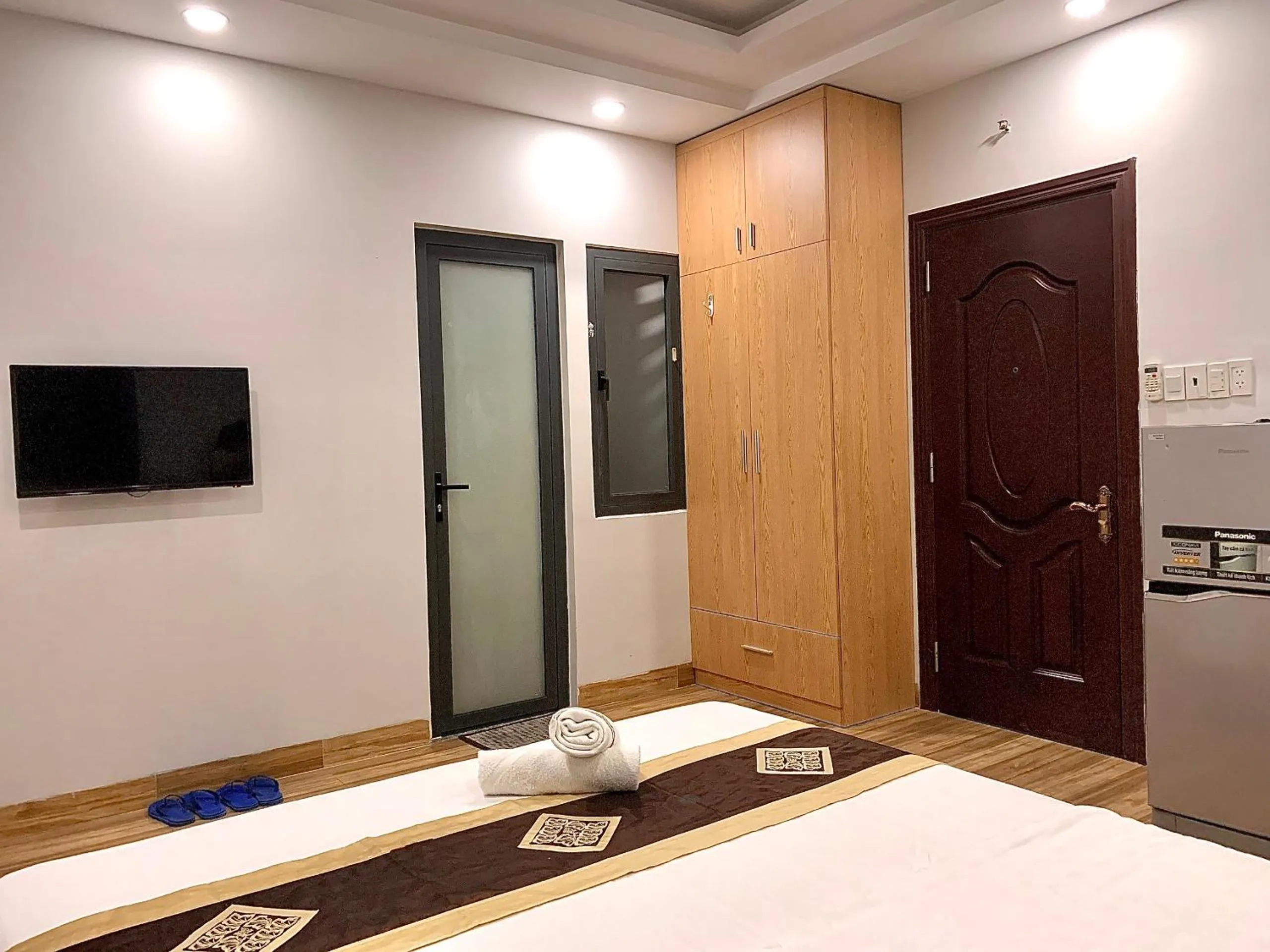 Photo of the whole room, Bed in The Lumiere near Tan Son Nhat Airport